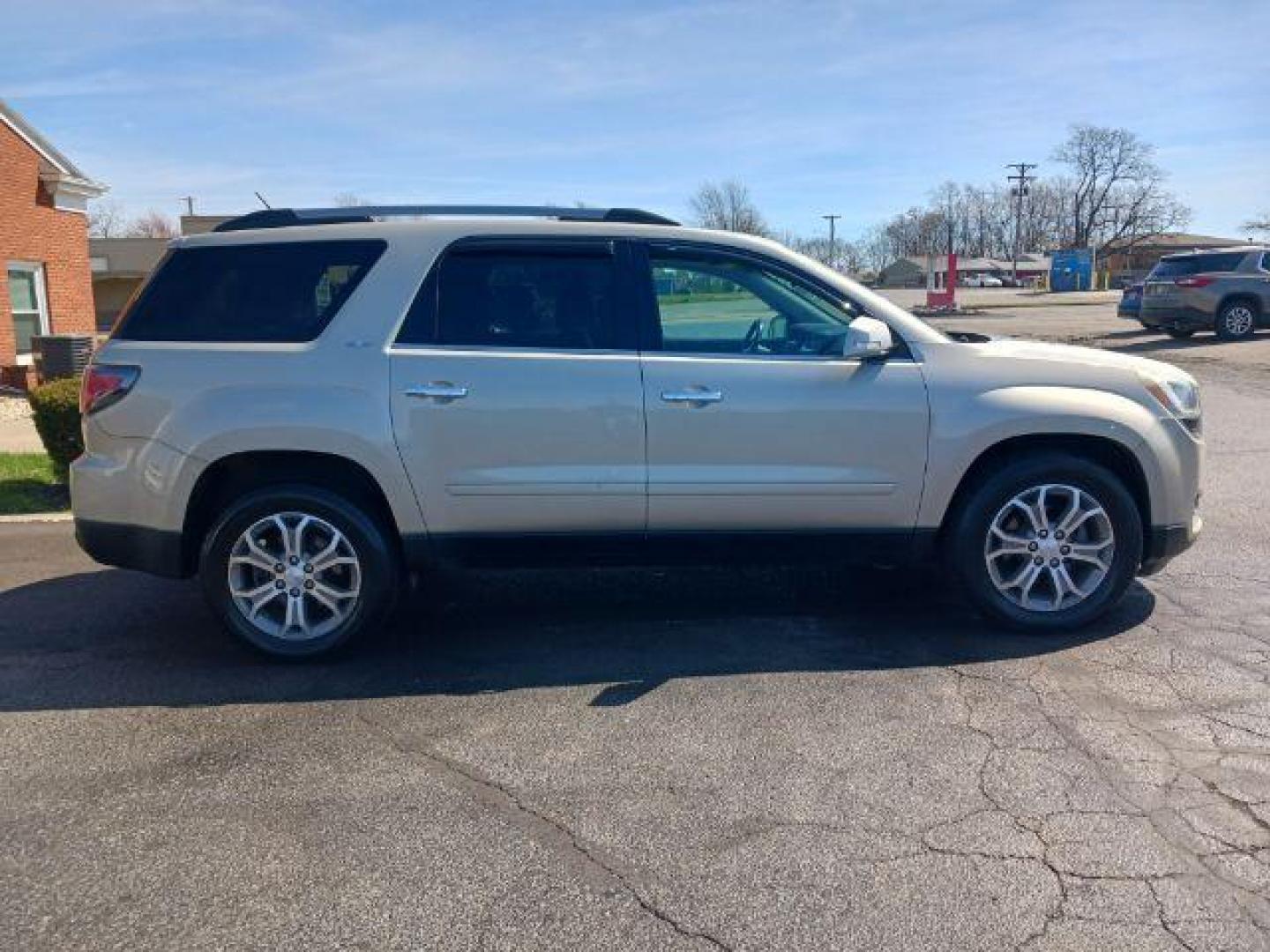 2013 Champagne Silver Metallic GMC Acadia SLT-1 AWD (1GKKVRKD0DJ) with an 3.6L V6 DOHC 24V engine, 6-Speed Automatic transmission, located at 401 Woodman Dr, Riverside, OH, 45431, (937) 908-9800, 39.763779, -84.122063 - Photo#4