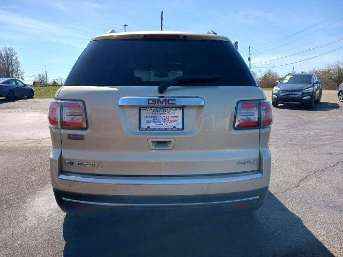 2013 Champagne Silver Metallic GMC Acadia SLT-1 AWD (1GKKVRKD0DJ) with an 3.6L V6 DOHC 24V engine, 6-Speed Automatic transmission, located at 401 Woodman Dr, Riverside, OH, 45431, (937) 908-9800, 39.763779, -84.122063 - Photo#5