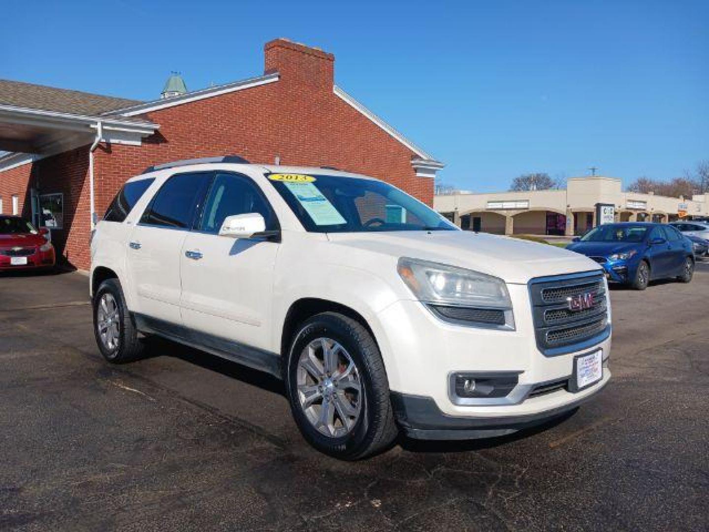 2013 Summit White GMC Acadia SLT-2 AWD (1GKKVSKD3DJ) with an 3.6L V6 DOHC 24V engine, 6-Speed Automatic transmission, located at 1230 East Main St, Xenia, OH, 45385, (937) 908-9800, 39.687321, -83.910294 - Photo#0