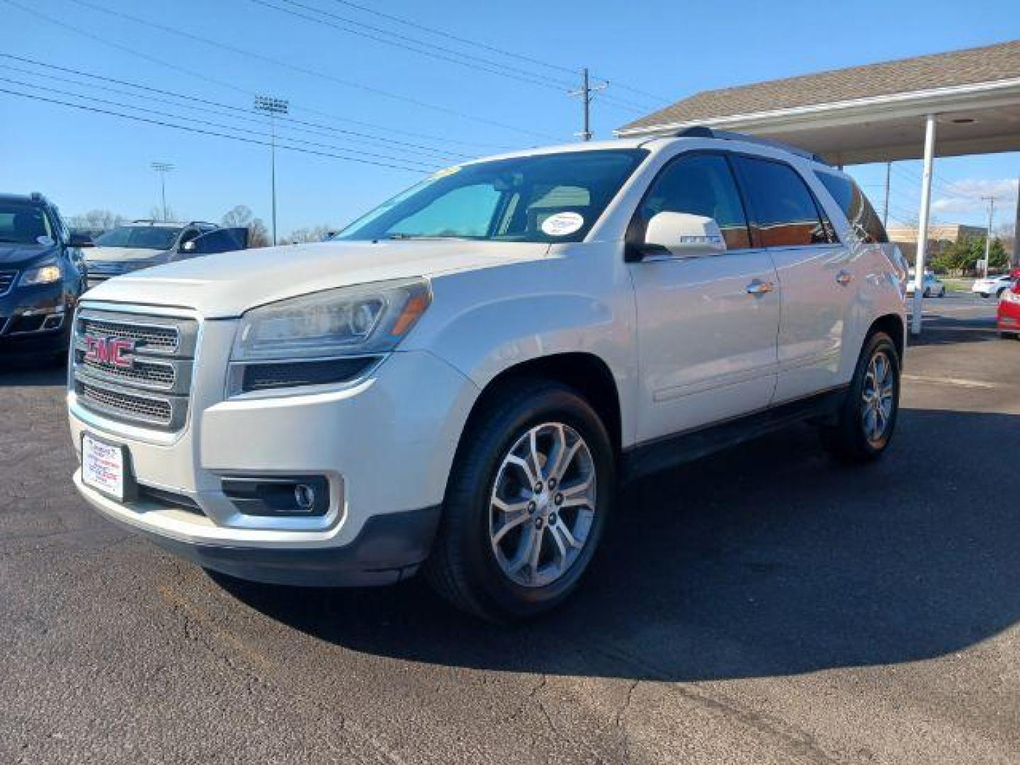 2013 Summit White GMC Acadia SLT-2 AWD (1GKKVSKD3DJ) with an 3.6L V6 DOHC 24V engine, 6-Speed Automatic transmission, located at 1230 East Main St, Xenia, OH, 45385, (937) 908-9800, 39.687321, -83.910294 - Photo#2