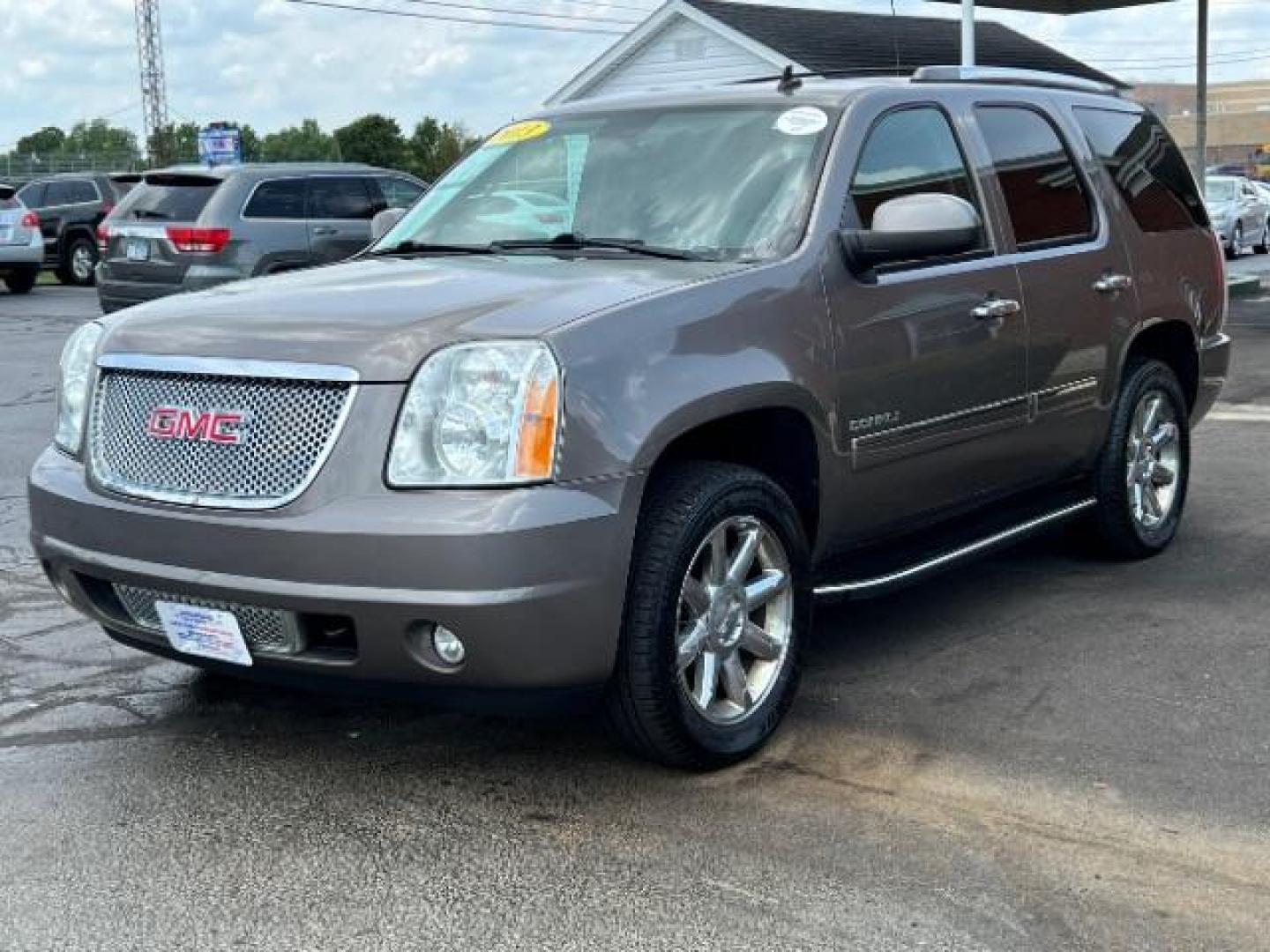 2013 Mocha Steel Metallic GMC Yukon Denali 4WD (1GKS2EEF1DR) with an 6.2L V8 OHV 16V engine, 6-Speed Automatic transmission, located at 880 E. National Road, Vandalia, OH, 45377, (937) 908-9800, 39.892189, -84.181015 - Photo#2