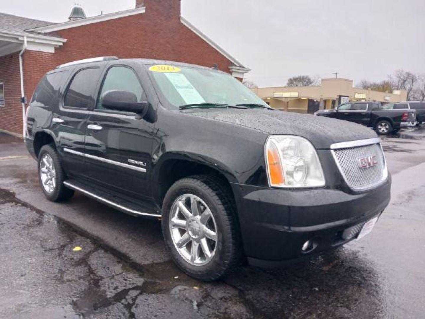 2013 Onyx Black GMC Yukon Denali 4WD (1GKS2EEF7DR) with an 6.2L V8 OHV 16V engine, 6-Speed Automatic transmission, located at 1951 S Dayton Lakeview Rd., New Carlisle, OH, 45344, (937) 908-9800, 39.890999, -84.050255 - Photo#0