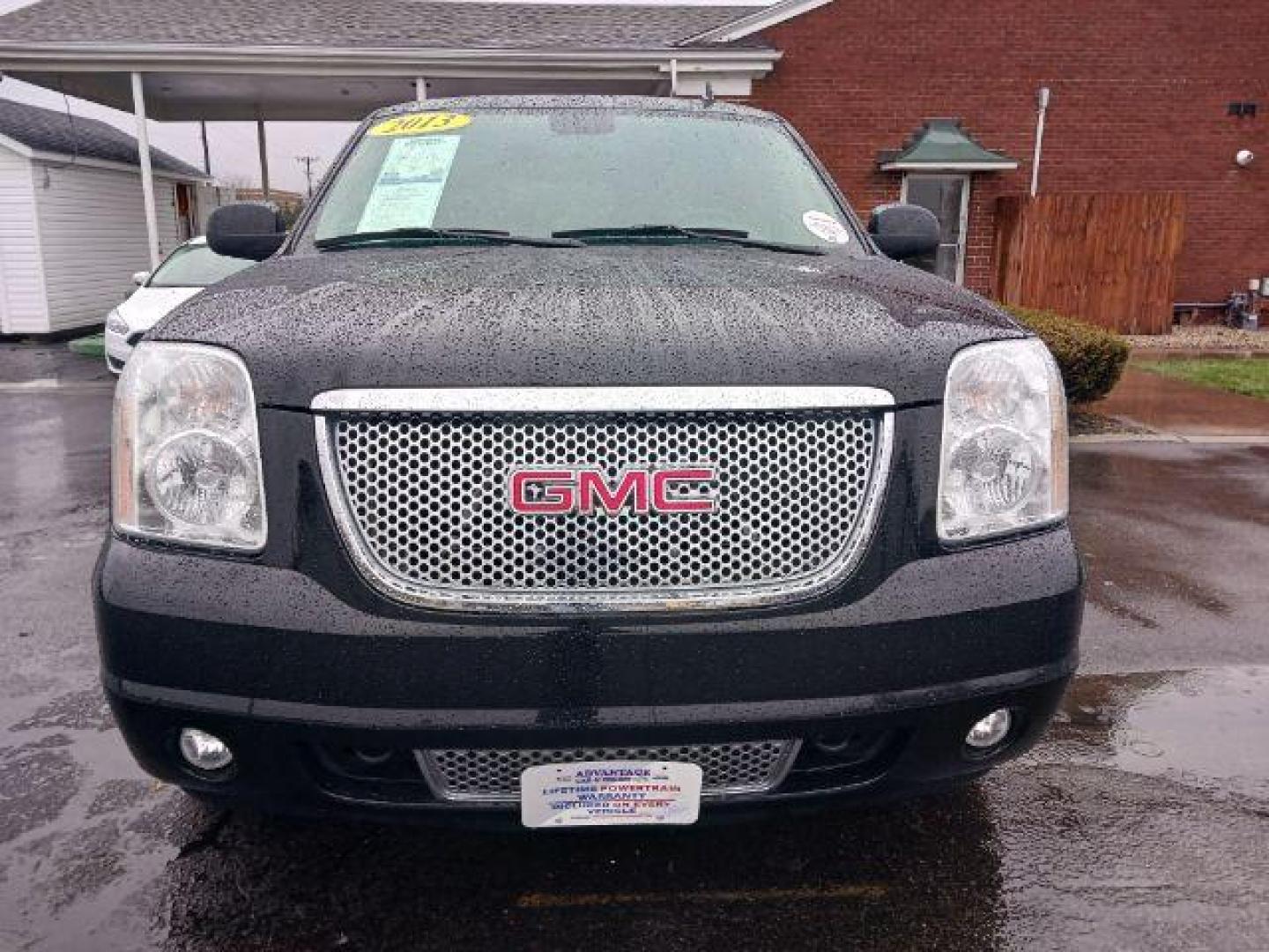 2013 Onyx Black GMC Yukon Denali 4WD (1GKS2EEF7DR) with an 6.2L V8 OHV 16V engine, 6-Speed Automatic transmission, located at 1951 S Dayton Lakeview Rd., New Carlisle, OH, 45344, (937) 908-9800, 39.890999, -84.050255 - Photo#1