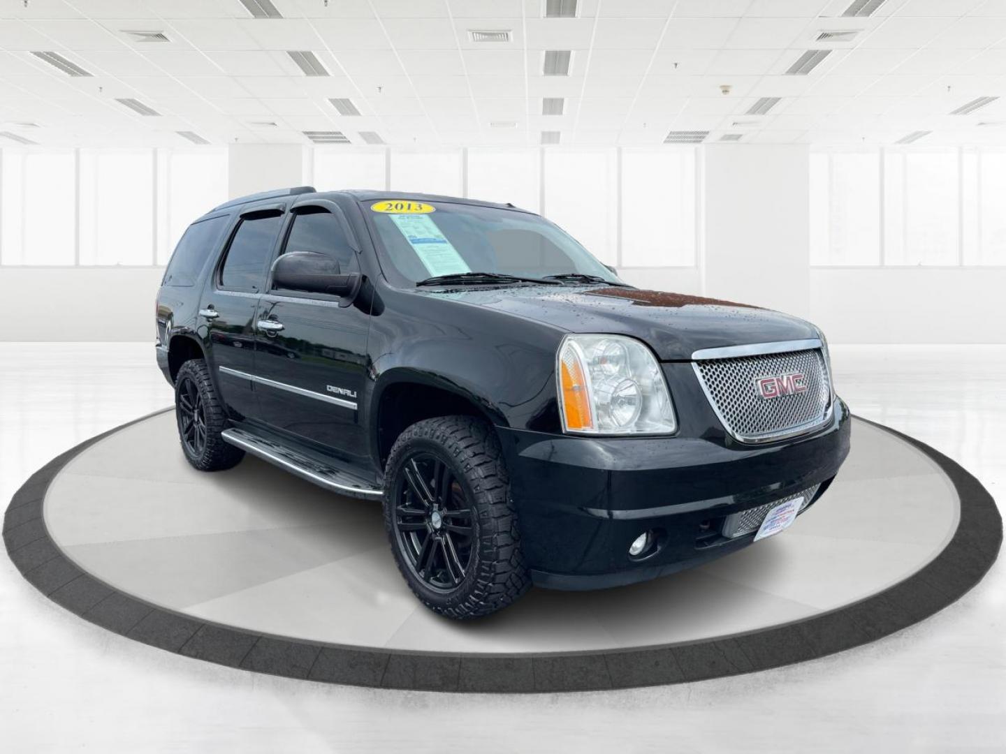 2013 Carbon Black Metallic GMC Yukon Denali 4WD (1GKS2EEF0DR) with an 6.2L V8 OHV 16V engine, 6-Speed Automatic transmission, located at 1099 N County Rd 25A, OH, 45373, (937) 908-9800, 40.057079, -84.212883 - Photo#0