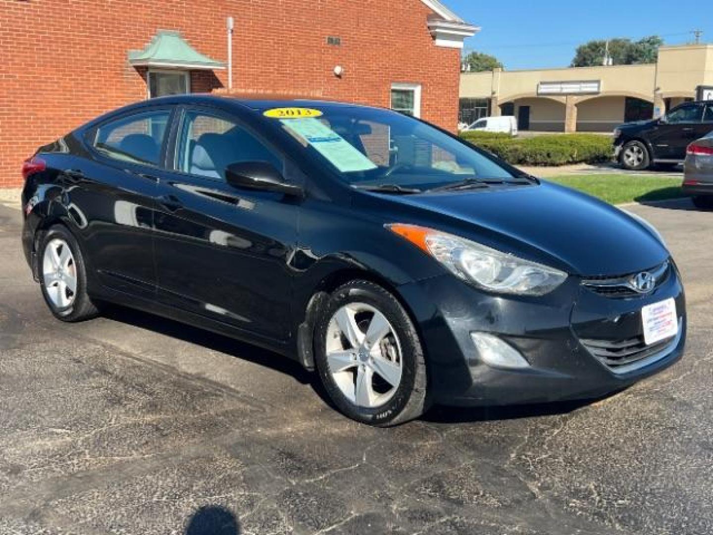 2013 Midnight Black Metallic Hyundai Elantra Limited (5NPDH4AE7DH) with an 1.8L L4 DOHC 16V engine, 6-Speed Automatic transmission, located at 1951 S Dayton Lakeview Rd., New Carlisle, OH, 45344, (937) 908-9800, 39.890999, -84.050255 - Photo#0