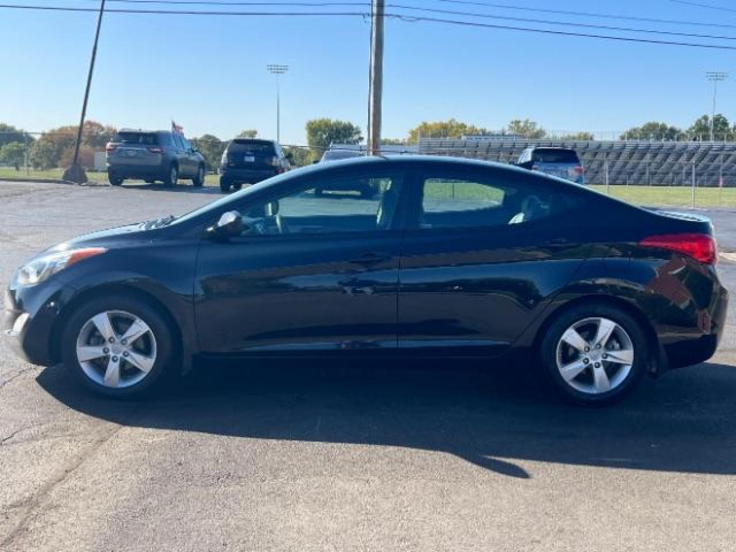 2013 Midnight Black Metallic Hyundai Elantra Limited (5NPDH4AE7DH) with an 1.8L L4 DOHC 16V engine, 6-Speed Automatic transmission, located at 1951 S Dayton Lakeview Rd., New Carlisle, OH, 45344, (937) 908-9800, 39.890999, -84.050255 - Photo#3