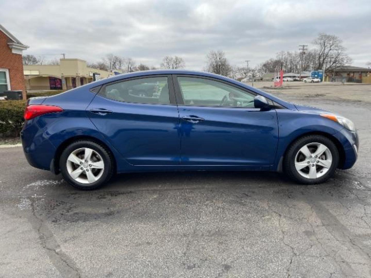 2013 Blue Sky Metallic Hyundai Elantra GLS A/T (KMHDH4AE7DU) with an 1.8L L4 DOHC 16V engine, 6-Speed Automatic transmission, located at 880 E. National Road, Vandalia, OH, 45377, (937) 908-9800, 39.892189, -84.181015 - Photo#4