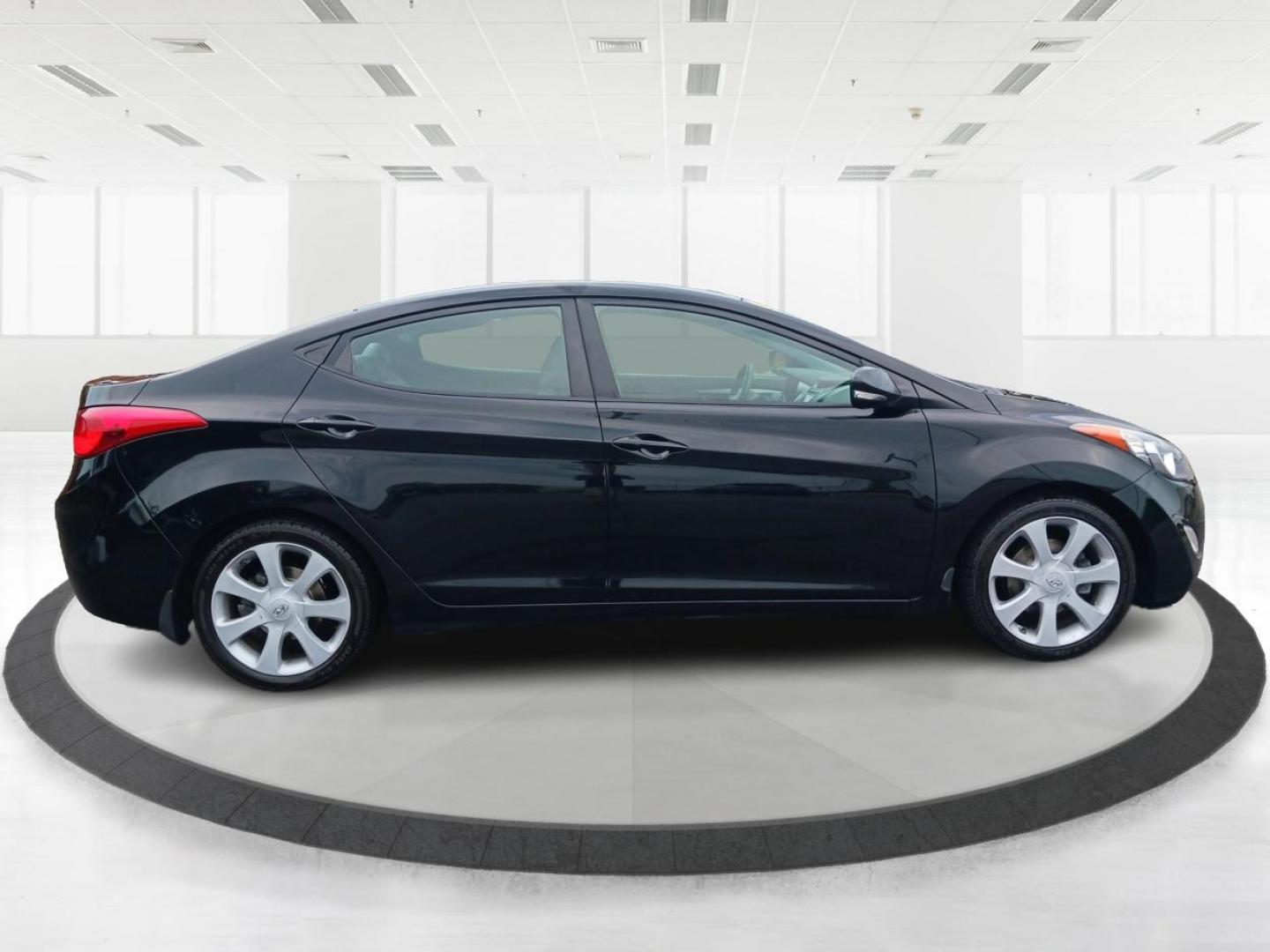 2013 Midnight Black Metallic Hyundai Elantra (5NPDH4AE0DH) with an 1.8L L4 DOHC 16V engine, 6-Speed Automatic transmission, located at 880 E. National Road, Vandalia, OH, 45377, (937) 908-9800, 39.892189, -84.181015 - Photo#1