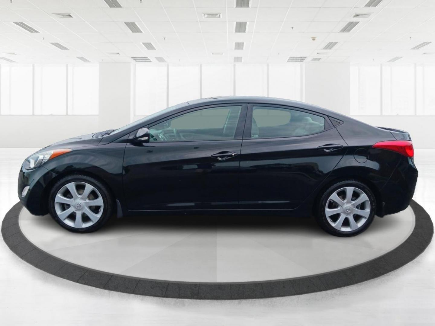 2013 Midnight Black Metallic Hyundai Elantra (5NPDH4AE0DH) with an 1.8L L4 DOHC 16V engine, 6-Speed Automatic transmission, located at 880 E. National Road, Vandalia, OH, 45377, (937) 908-9800, 39.892189, -84.181015 - Photo#5