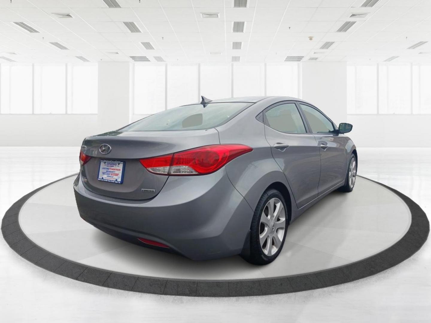 2013 Harbor Gray Metallic Hyundai Elantra Limited (KMHDH4AE1DU) with an 1.8L L4 DOHC 16V engine, 6-Speed Automatic transmission, located at 1099 N County Rd 25A, OH, 45373, (937) 908-9800, 40.057079, -84.212883 - Photo#2