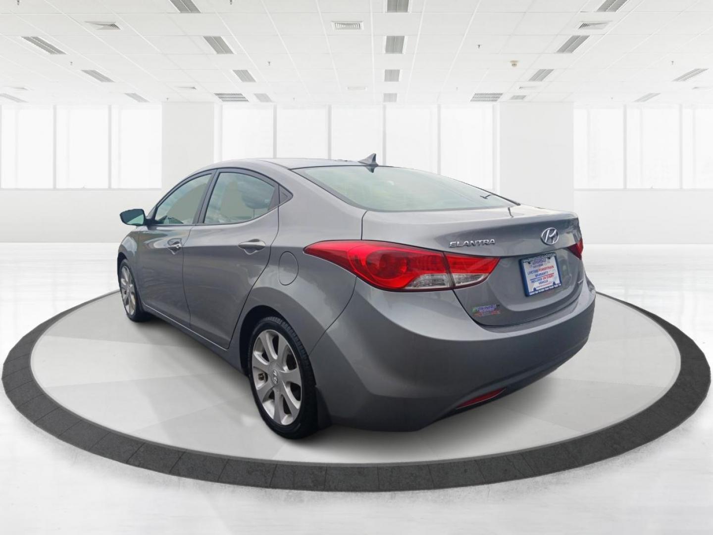 2013 Harbor Gray Metallic Hyundai Elantra Limited (KMHDH4AE1DU) with an 1.8L L4 DOHC 16V engine, 6-Speed Automatic transmission, located at 1099 N County Rd 25A, OH, 45373, (937) 908-9800, 40.057079, -84.212883 - Photo#4