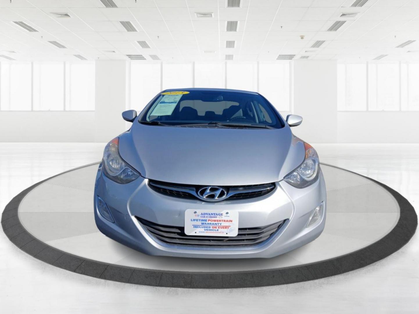 2013 Radiant Silver Metallic Hyundai Elantra Limited (5NPDH4AEXDH) with an 1.8L L4 DOHC 16V engine, 6-Speed Automatic transmission, located at 1099 N County Rd 25A, OH, 45373, (937) 908-9800, 40.057079, -84.212883 - Photo#6