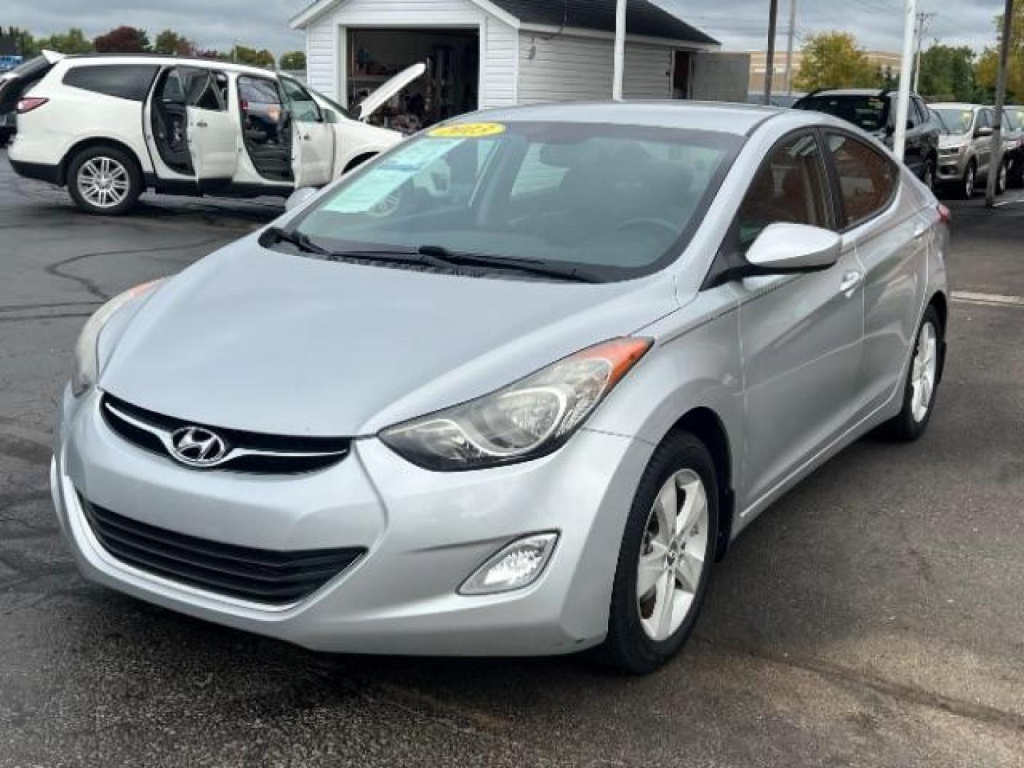 2013 Radiant Silver Metallic Hyundai Elantra GLS A/T (KMHDH4AE5DU) with an 1.8L L4 DOHC 16V engine, 6-Speed Automatic transmission, located at 401 Woodman Dr, Riverside, OH, 45431, (937) 908-9800, 39.763779, -84.122063 - Photo#2