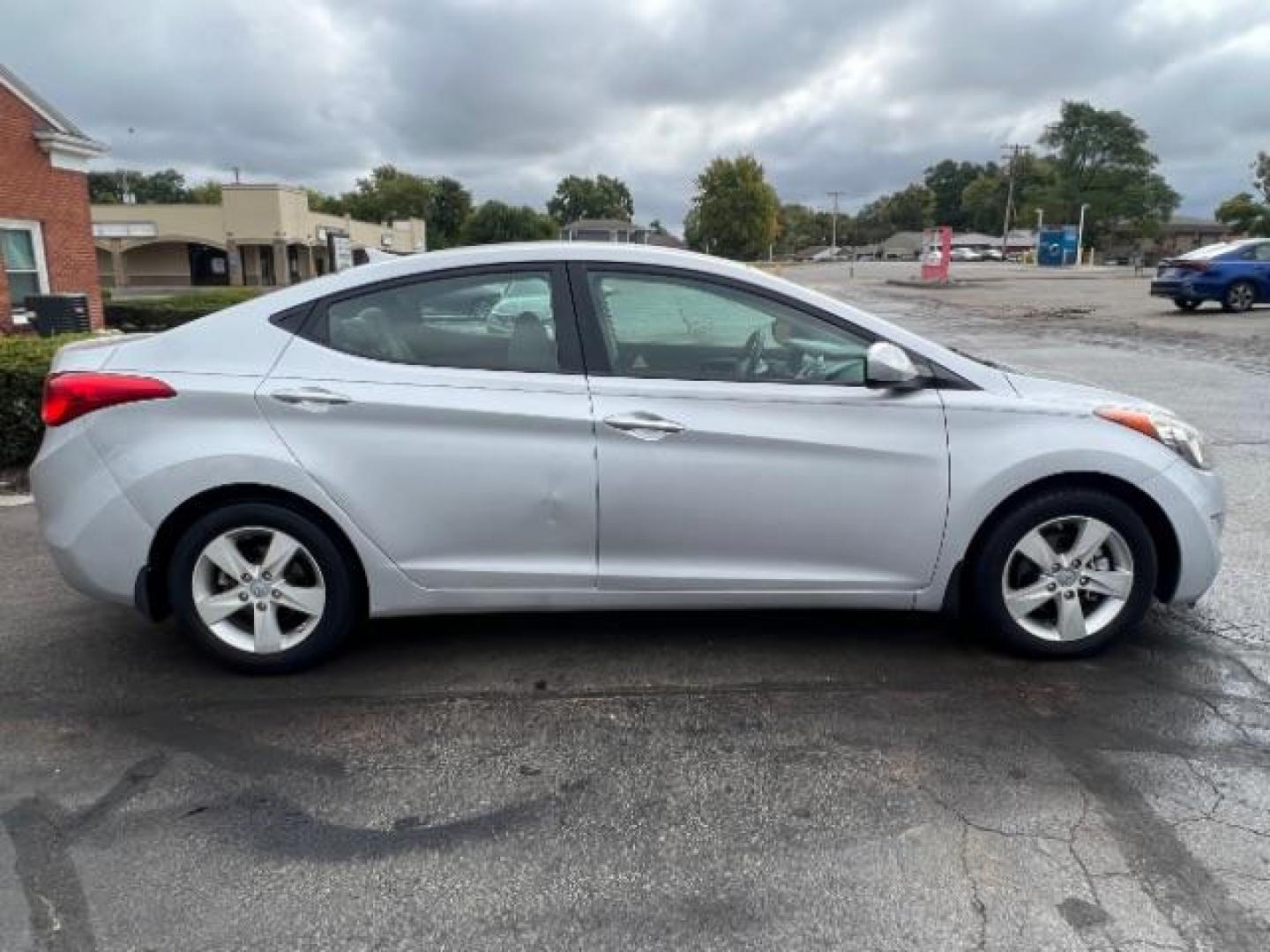 2013 Radiant Silver Metallic Hyundai Elantra GLS A/T (KMHDH4AE5DU) with an 1.8L L4 DOHC 16V engine, 6-Speed Automatic transmission, located at 401 Woodman Dr, Riverside, OH, 45431, (937) 908-9800, 39.763779, -84.122063 - Photo#5