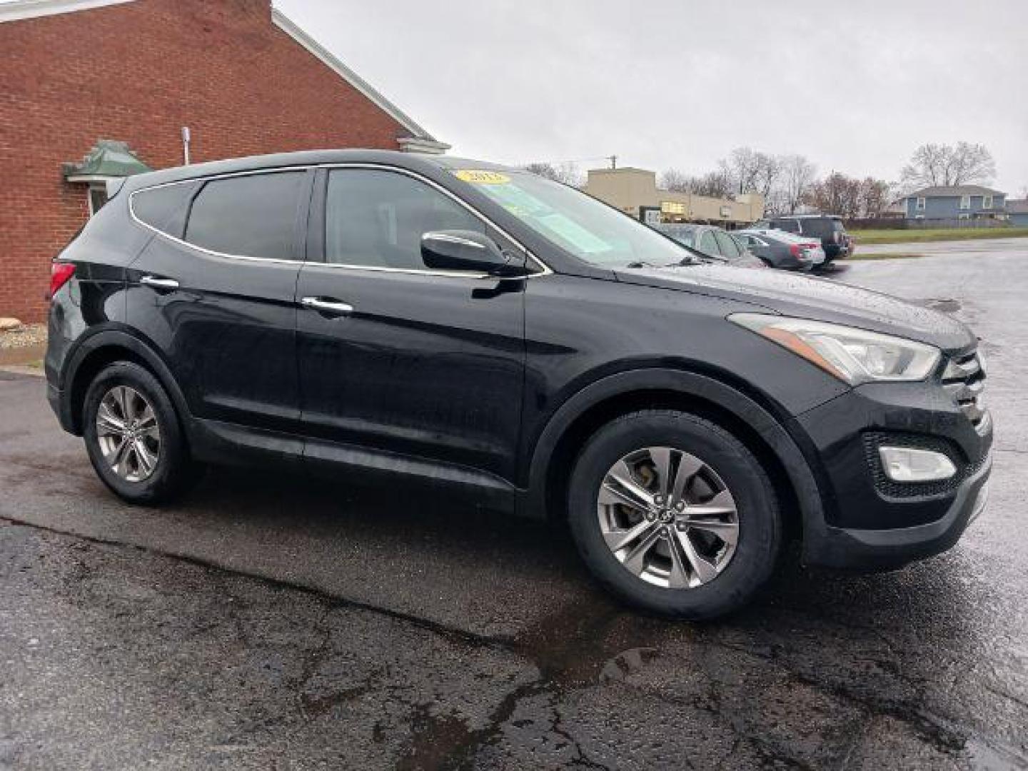 2013 Twilight Black Hyundai Santa Fe Sport 2.4 FWD (5XYZU3LB3DG) with an 2.4L L4 DOHC 16V engine, 6-Speed Automatic transmission, located at 401 Woodman Dr, Riverside, OH, 45431, (937) 908-9800, 39.763779, -84.122063 - Photo#0