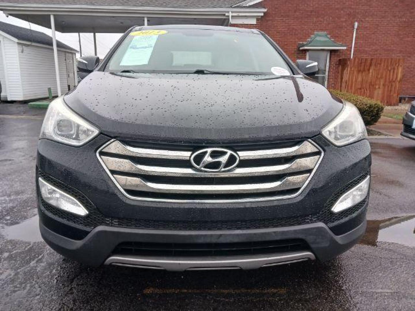 2013 Twilight Black Hyundai Santa Fe Sport 2.4 FWD (5XYZU3LB3DG) with an 2.4L L4 DOHC 16V engine, 6-Speed Automatic transmission, located at 401 Woodman Dr, Riverside, OH, 45431, (937) 908-9800, 39.763779, -84.122063 - Photo#1