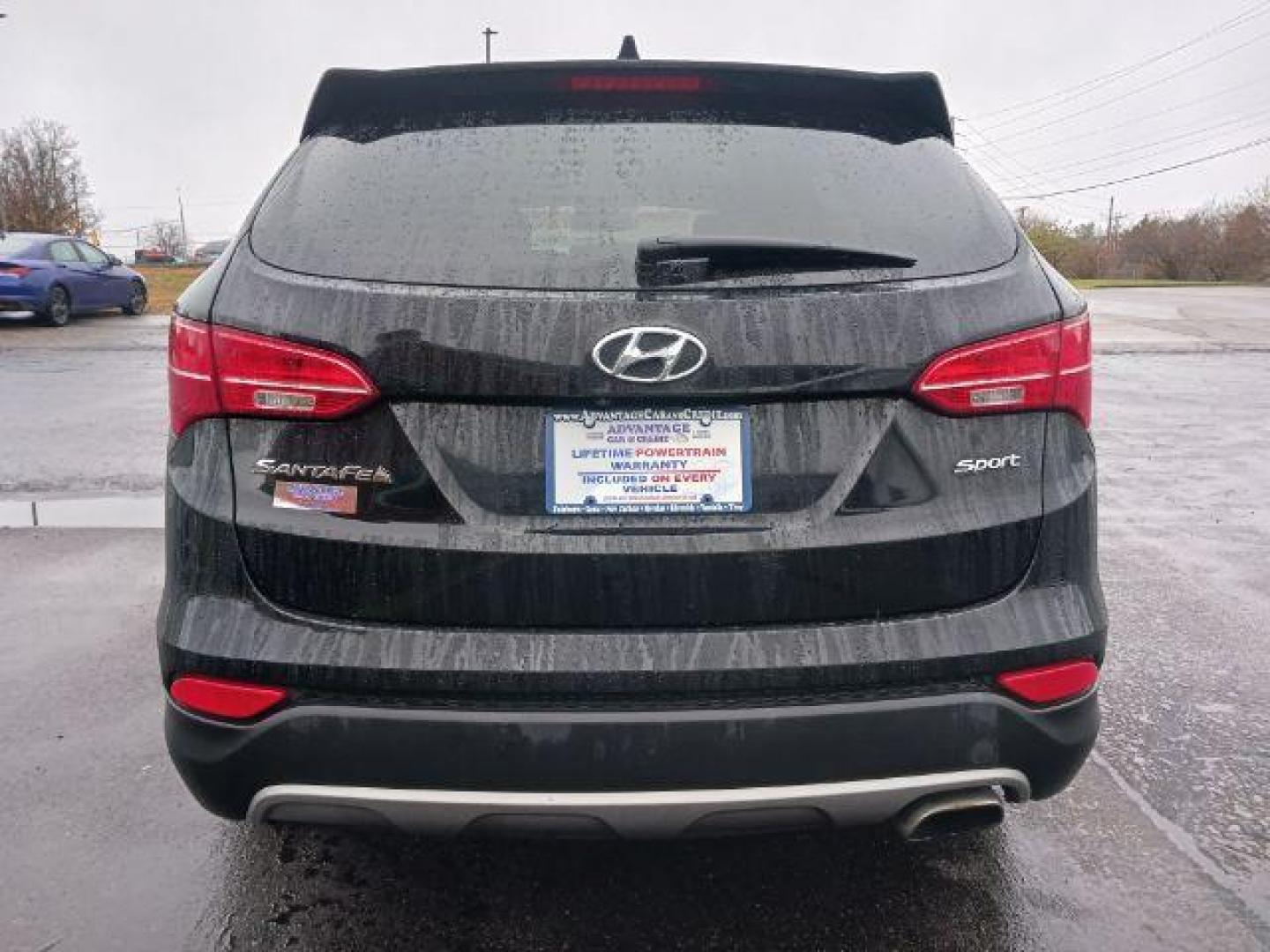 2013 Twilight Black Hyundai Santa Fe Sport 2.4 FWD (5XYZU3LB3DG) with an 2.4L L4 DOHC 16V engine, 6-Speed Automatic transmission, located at 401 Woodman Dr, Riverside, OH, 45431, (937) 908-9800, 39.763779, -84.122063 - Photo#5