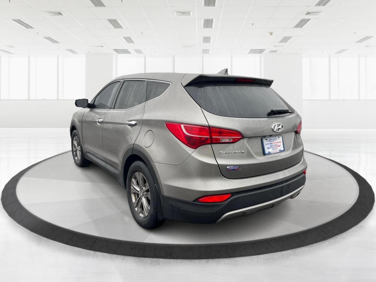 2013 Mineral Gray Hyundai Santa Fe Sport 2.4 AWD (5XYZUDLBXDG) with an 2.4L L4 DOHC 16V engine, 6-Speed Automatic transmission, located at 1184 Kauffman Ave, Fairborn, OH, 45324, (937) 908-9800, 39.807072, -84.030914 - 2013 Hyundai Santa Fe Sport 2.4 AWD - Photo#4