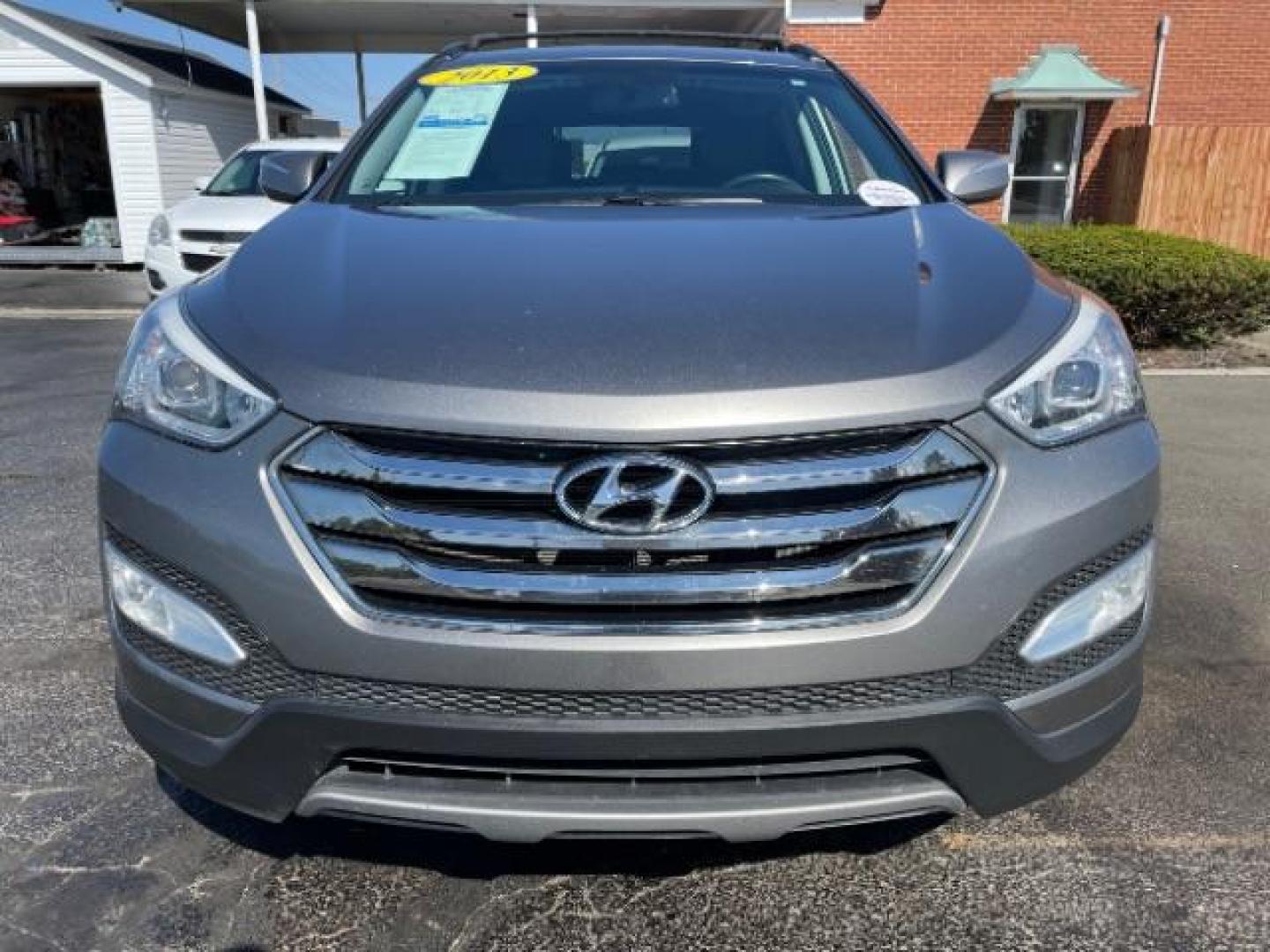 2013 Mineral Gray Hyundai Santa Fe Sport 2.0 FWD (5XYZU3LA8DG) with an 2.0L L4 DOHC 16V engine, 6-Speed Automatic transmission, located at 1951 S Dayton Lakeview Rd., New Carlisle, OH, 45344, (937) 908-9800, 39.890999, -84.050255 - Photo#2