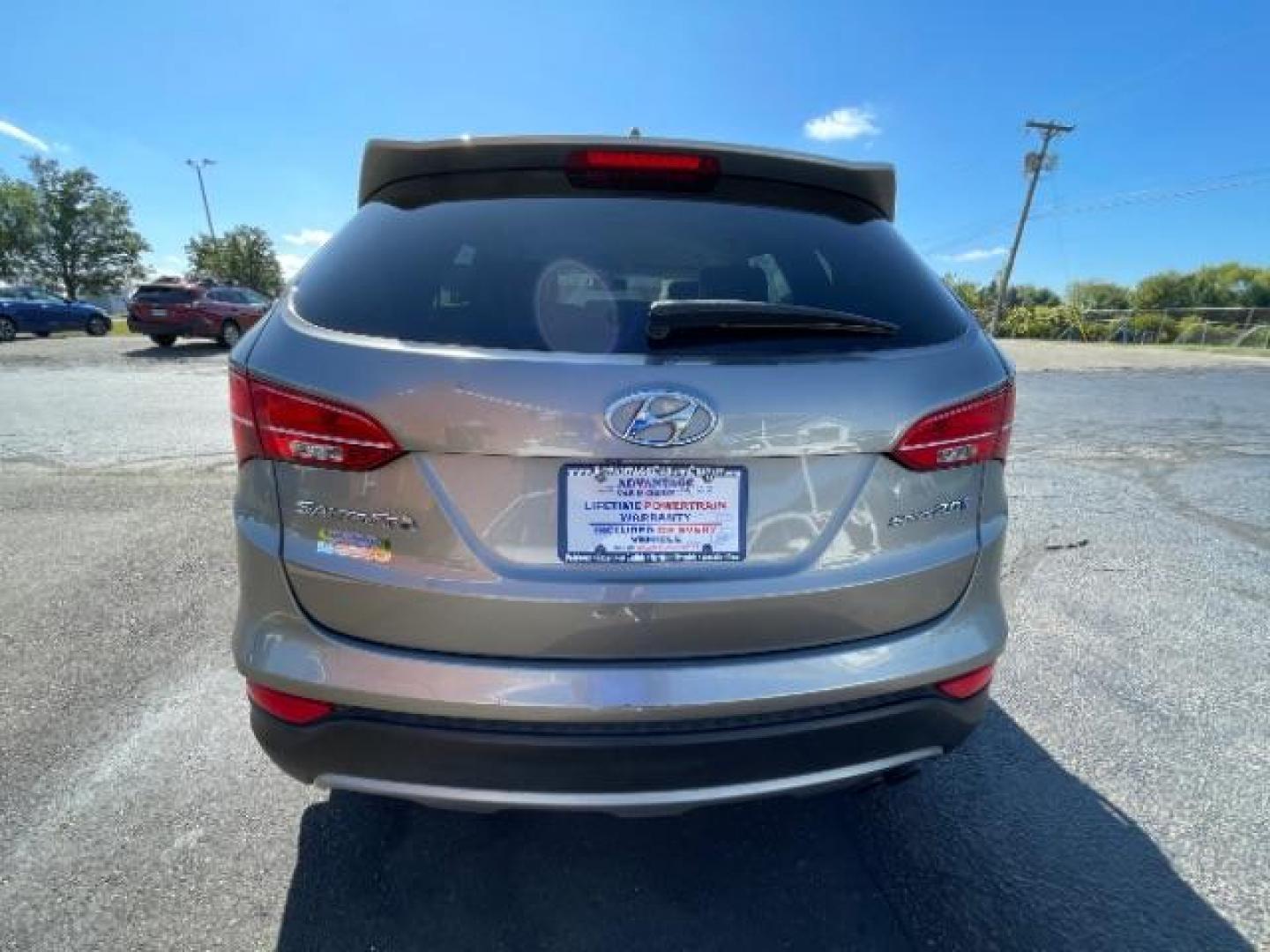 2013 Mineral Gray Hyundai Santa Fe Sport 2.0 FWD (5XYZU3LA8DG) with an 2.0L L4 DOHC 16V engine, 6-Speed Automatic transmission, located at 1951 S Dayton Lakeview Rd., New Carlisle, OH, 45344, (937) 908-9800, 39.890999, -84.050255 - Photo#3