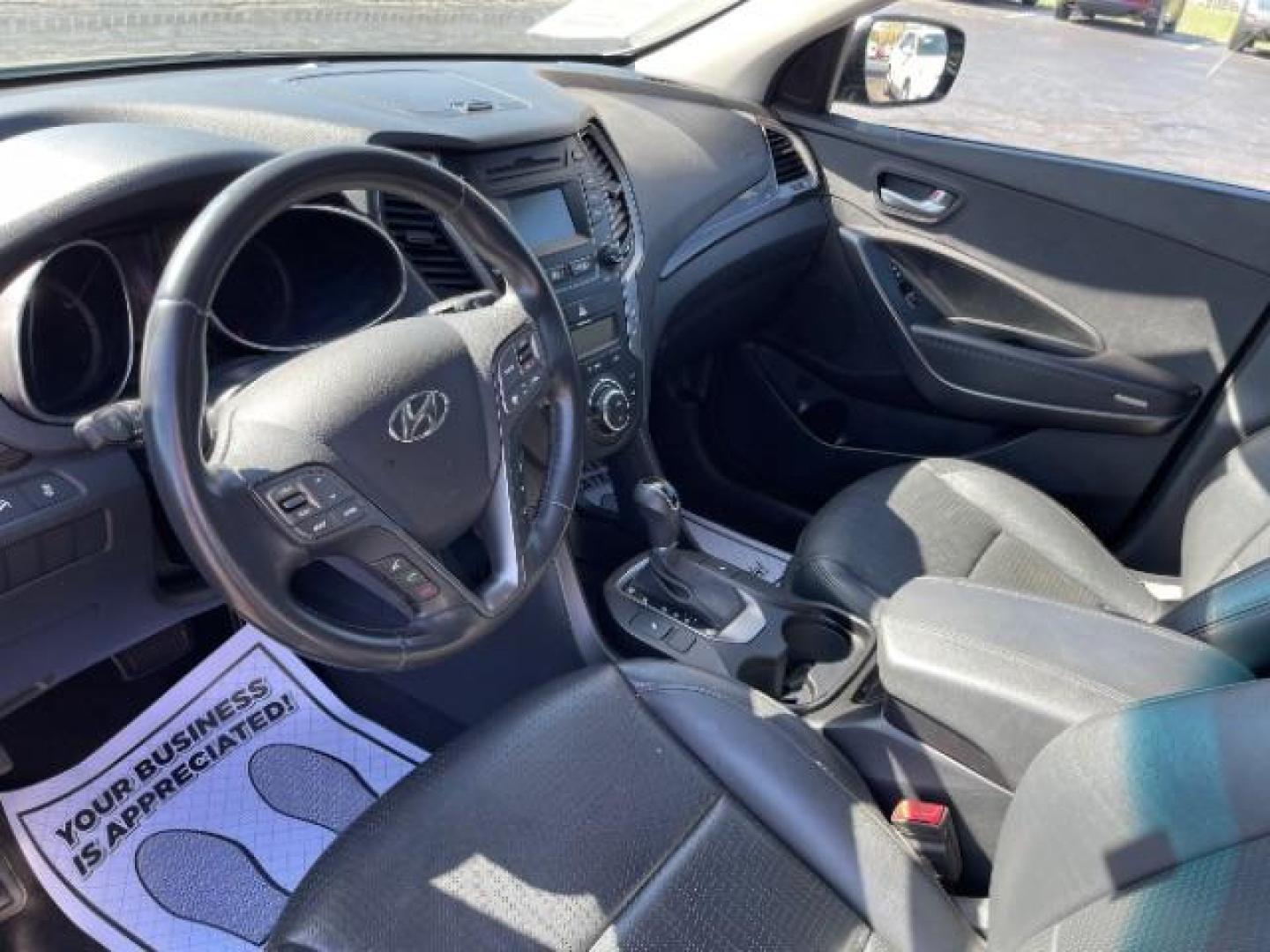 2013 Mineral Gray Hyundai Santa Fe Sport 2.0 FWD (5XYZU3LA8DG) with an 2.0L L4 DOHC 16V engine, 6-Speed Automatic transmission, located at 1951 S Dayton Lakeview Rd., New Carlisle, OH, 45344, (937) 908-9800, 39.890999, -84.050255 - Photo#6