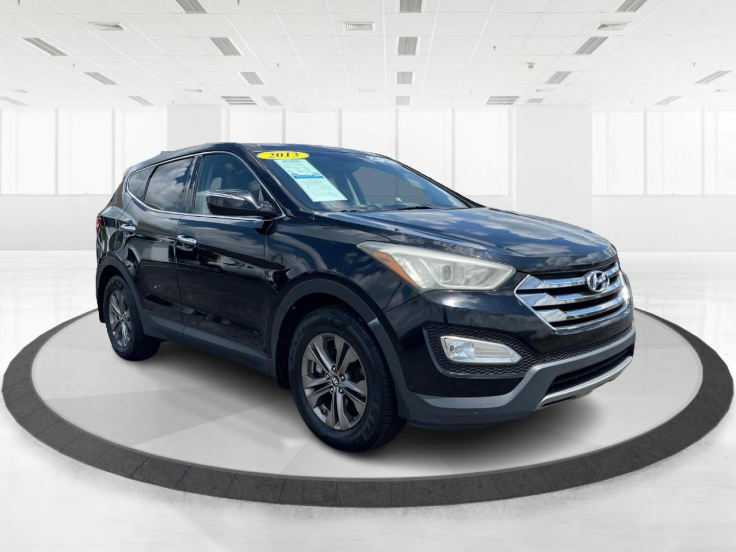 2013 Twilight Black Hyundai Santa Fe Sport 2.4 AWD (5XYZUDLB8DG) with an 2.4L L4 DOHC 16V engine, 6-Speed Automatic transmission, located at 1099 N County Rd 25A, OH, 45373, (937) 908-9800, 40.057079, -84.212883 - Photo#0