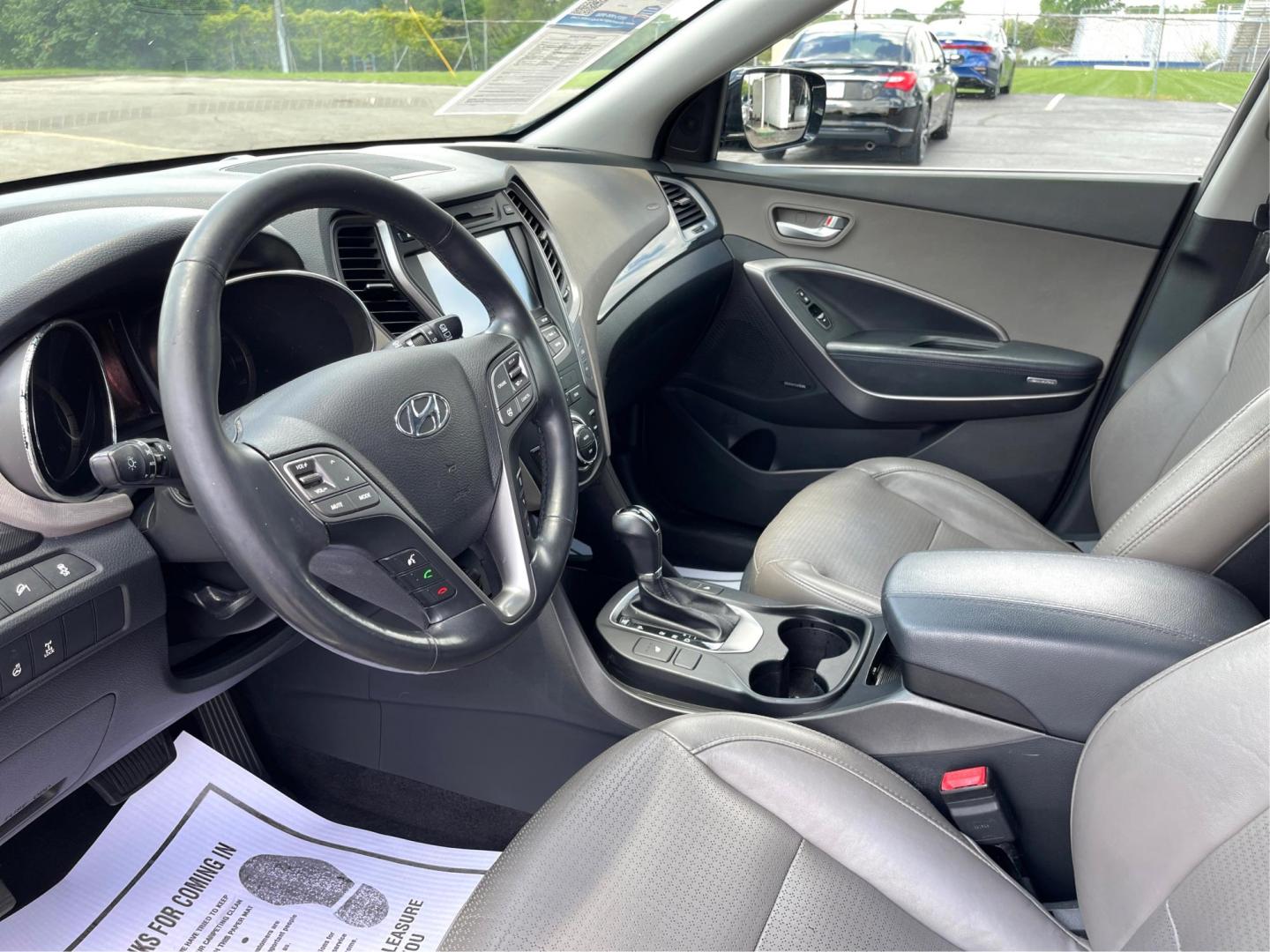 2013 Twilight Black Hyundai Santa Fe Sport 2.4 AWD (5XYZUDLB8DG) with an 2.4L L4 DOHC 16V engine, 6-Speed Automatic transmission, located at 1099 N County Rd 25A, OH, 45373, (937) 908-9800, 40.057079, -84.212883 - Photo#8