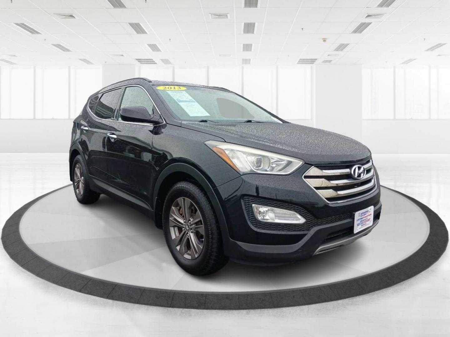 2013 Twilight Black Hyundai Santa Fe Sport 2.4 AWD (5XYZUDLB5DG) with an 2.4L L4 DOHC 16V engine, 6-Speed Automatic transmission, located at 1099 N County Rd 25A, OH, 45373, (937) 908-9800, 40.057079, -84.212883 - Photo#0