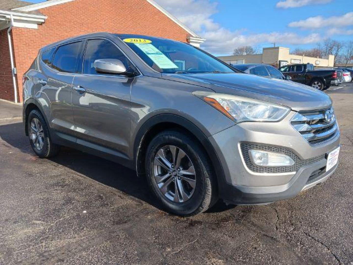 2013 Mineral Gray Hyundai Santa Fe Sport 2.4 AWD (5XYZUDLBXDG) with an 2.4L L4 DOHC 16V engine, 6-Speed Automatic transmission, located at 1951 S Dayton Lakeview Rd., New Carlisle, OH, 45344, (937) 908-9800, 39.890999, -84.050255 - Photo#0