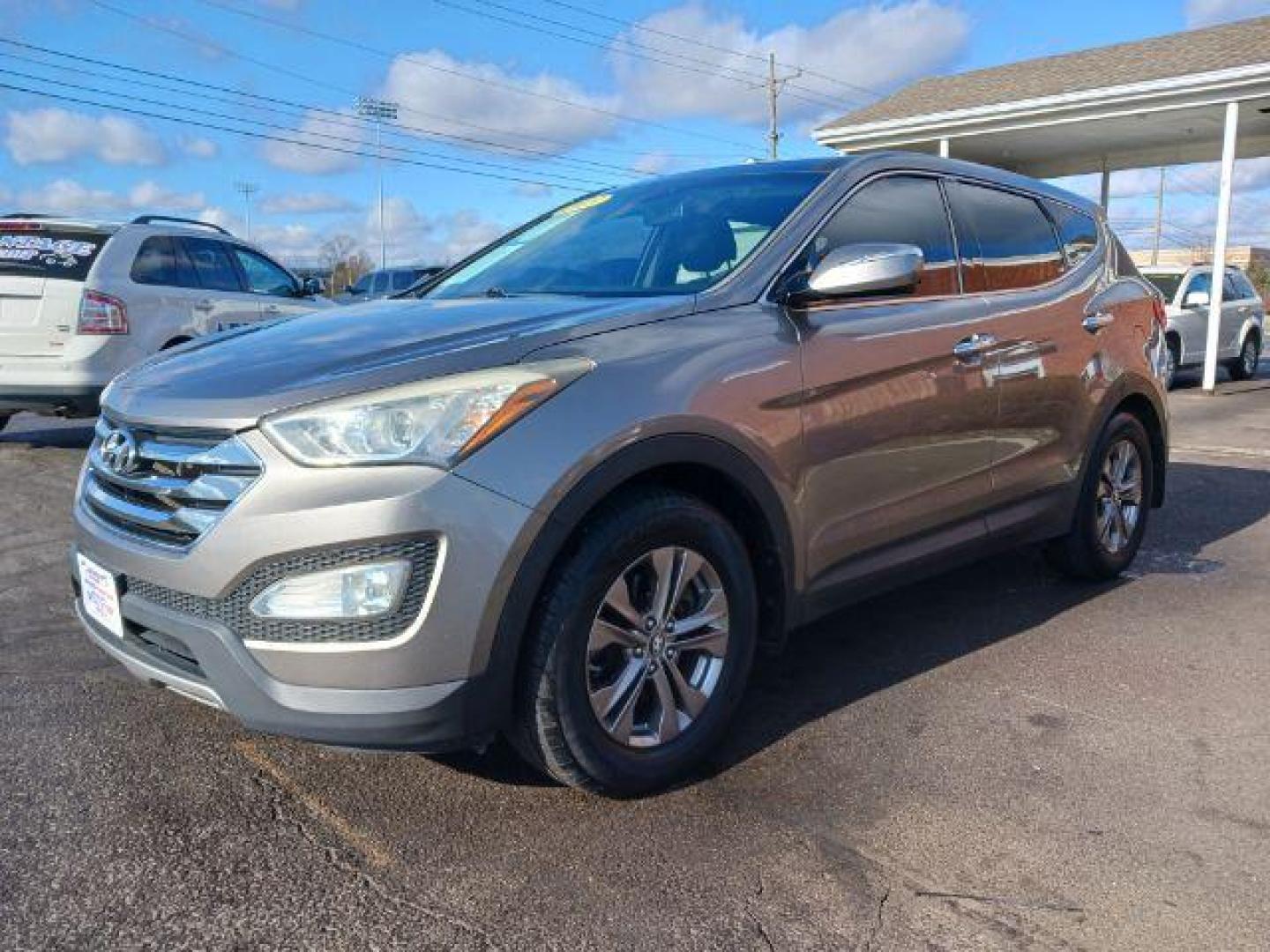 2013 Mineral Gray Hyundai Santa Fe Sport 2.4 AWD (5XYZUDLBXDG) with an 2.4L L4 DOHC 16V engine, 6-Speed Automatic transmission, located at 1951 S Dayton Lakeview Rd., New Carlisle, OH, 45344, (937) 908-9800, 39.890999, -84.050255 - Photo#2