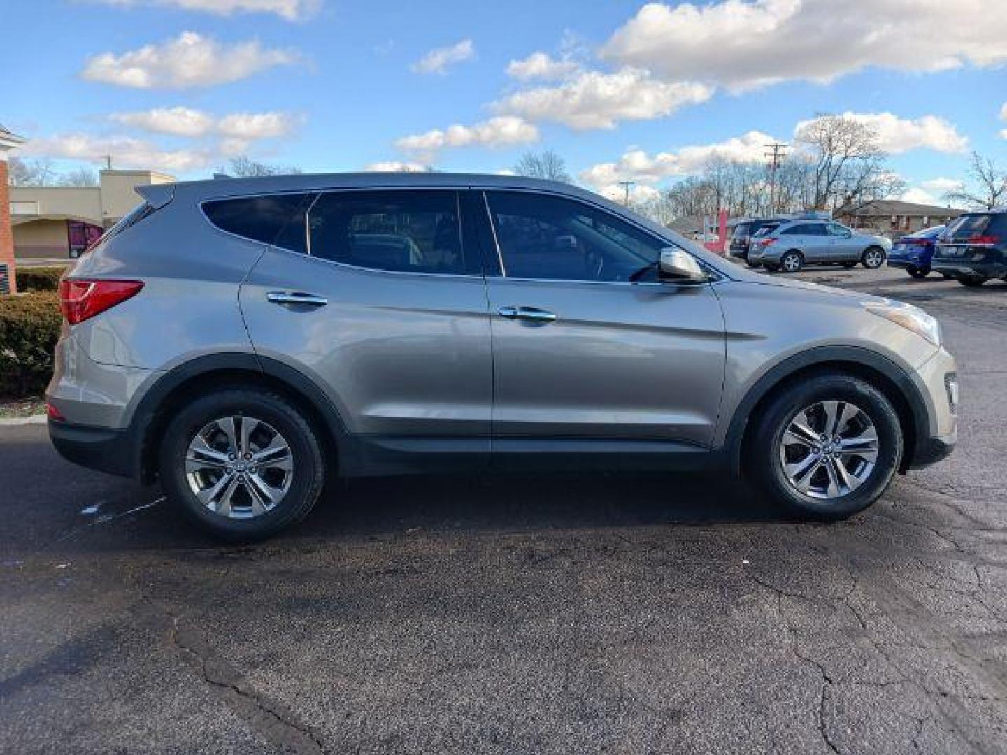 2013 Mineral Gray Hyundai Santa Fe Sport 2.4 AWD (5XYZUDLBXDG) with an 2.4L L4 DOHC 16V engine, 6-Speed Automatic transmission, located at 1951 S Dayton Lakeview Rd., New Carlisle, OH, 45344, (937) 908-9800, 39.890999, -84.050255 - Photo#4