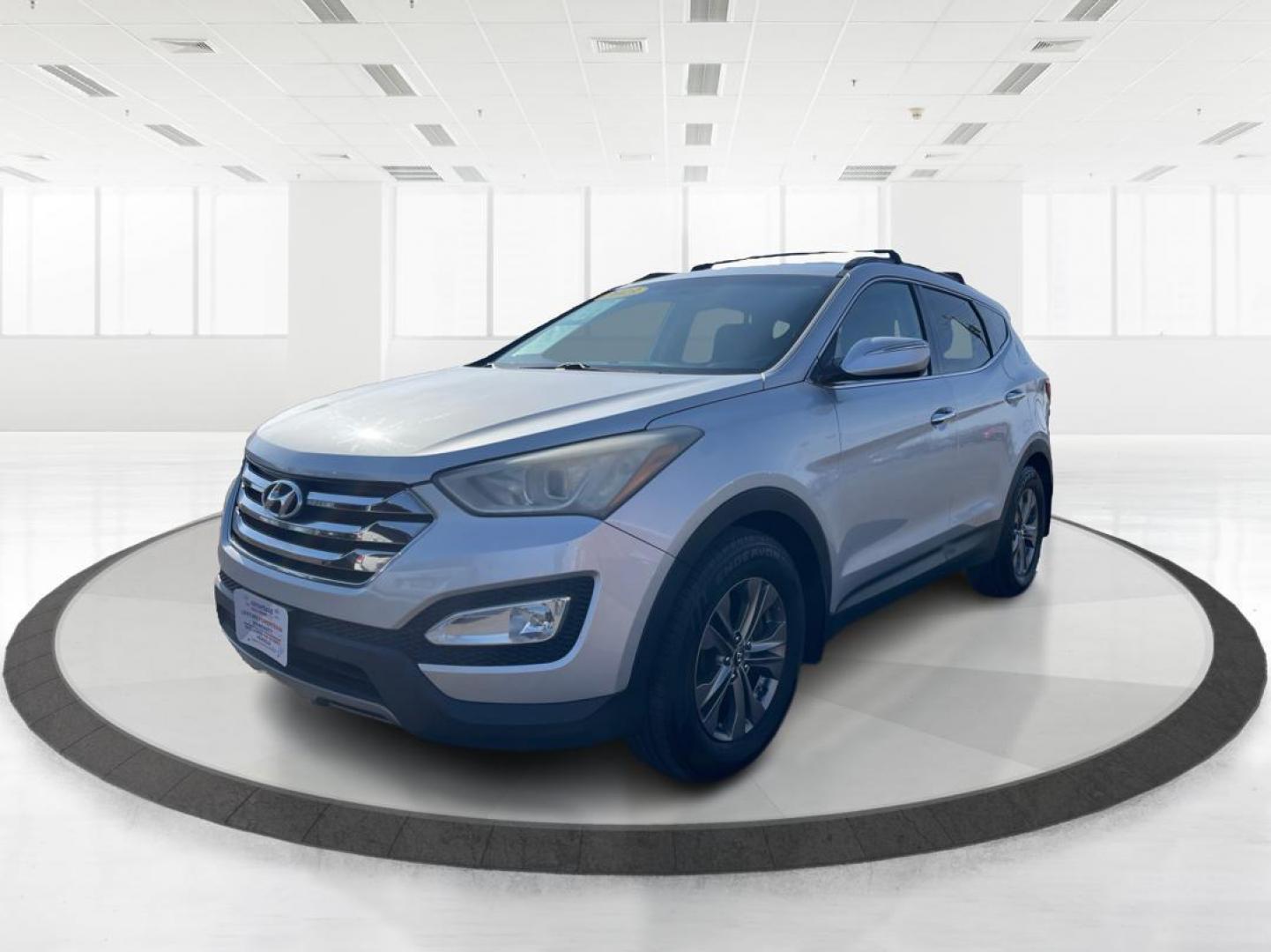 2013 Hyundai Santa Fe Sport (5XYZUDLB0DG) with an Theta II 2.4L I-4 gasoline direct injection engine, located at 401 Woodman Dr, Riverside, OH, 45431, (937) 908-9800, 39.760899, -84.123421 - 2013 Hyundai Santa Fe Sport - Photo#7