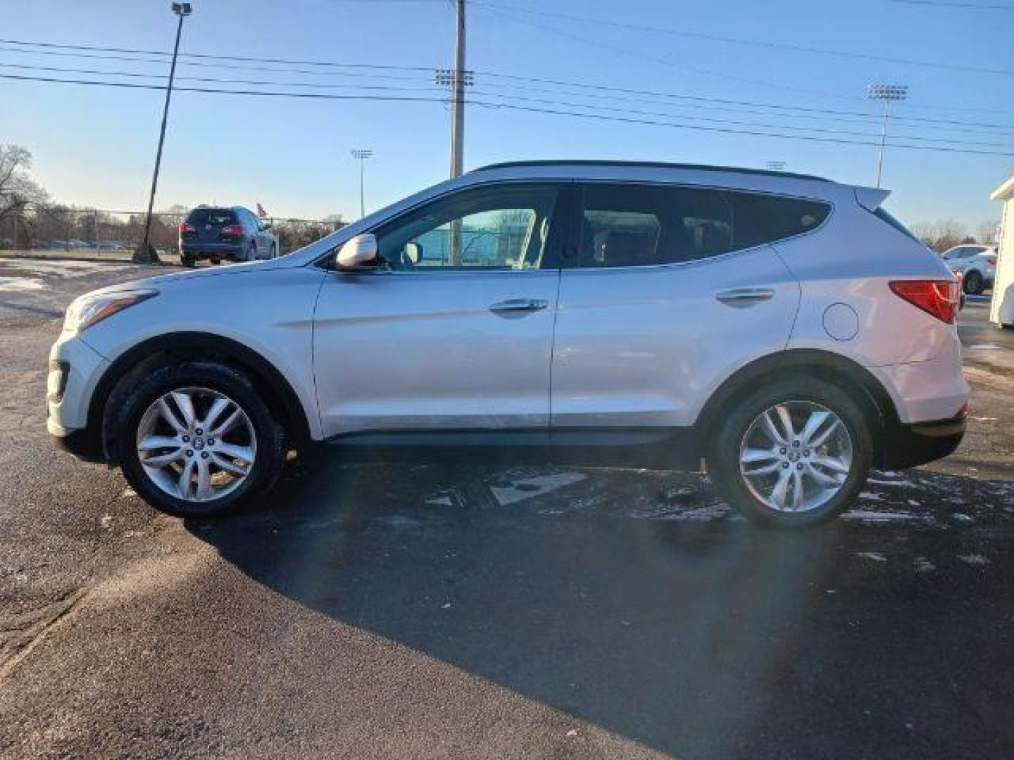 2013 Moonstone Silver Hyundai Santa Fe Sport 2.0 AWD (5XYZUDLA4DG) with an 2.0L L4 DOHC 16V engine, 6-Speed Automatic transmission, located at 1230 East Main St, Xenia, OH, 45385, (937) 908-9800, 39.687321, -83.910294 - Photo#3