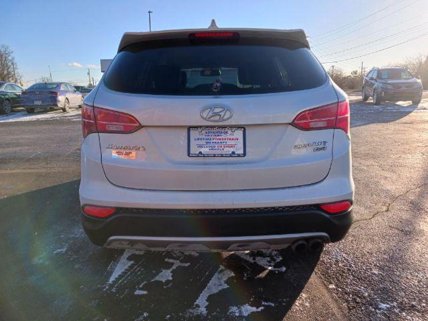 2013 Moonstone Silver Hyundai Santa Fe Sport 2.0 AWD (5XYZUDLA4DG) with an 2.0L L4 DOHC 16V engine, 6-Speed Automatic transmission, located at 1230 East Main St, Xenia, OH, 45385, (937) 908-9800, 39.687321, -83.910294 - Photo#5