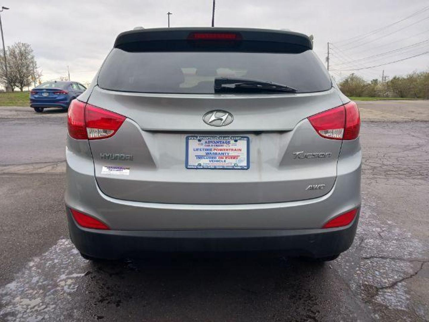 2013 Diamond Silver Metallic Hyundai Tucson GLS AWD (KM8JUCAC2DU) with an 2.4L L4 DOHC 16V engine, 6-Speed Automatic transmission, located at 401 Woodman Dr, Riverside, OH, 45431, (937) 908-9800, 39.763779, -84.122063 - Photo#5