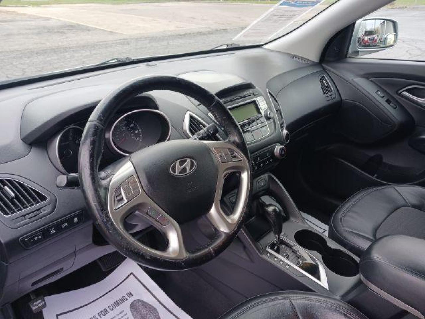 2013 Diamond Silver Metallic Hyundai Tucson GLS AWD (KM8JUCAC2DU) with an 2.4L L4 DOHC 16V engine, 6-Speed Automatic transmission, located at 401 Woodman Dr, Riverside, OH, 45431, (937) 908-9800, 39.763779, -84.122063 - Photo#6