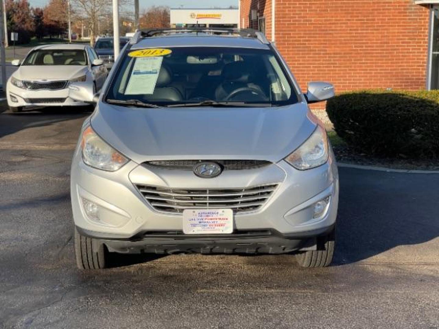 2013 Diamond Silver Metallic Hyundai Tucson GLS AWD (KM8JUCAC1DU) with an 2.4L L4 DOHC 16V engine, 6-Speed Automatic transmission, located at 1230 East Main St, Xenia, OH, 45385, (937) 908-9800, 39.687321, -83.910294 - Photo#5