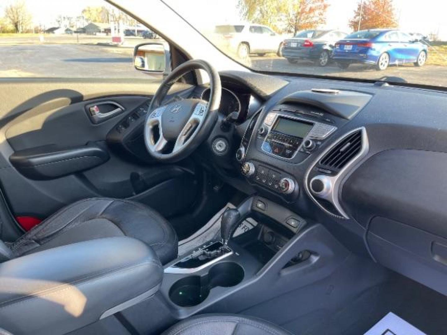 2013 Diamond Silver Metallic Hyundai Tucson GLS AWD (KM8JUCAC1DU) with an 2.4L L4 DOHC 16V engine, 6-Speed Automatic transmission, located at 1230 East Main St, Xenia, OH, 45385, (937) 908-9800, 39.687321, -83.910294 - Photo#8