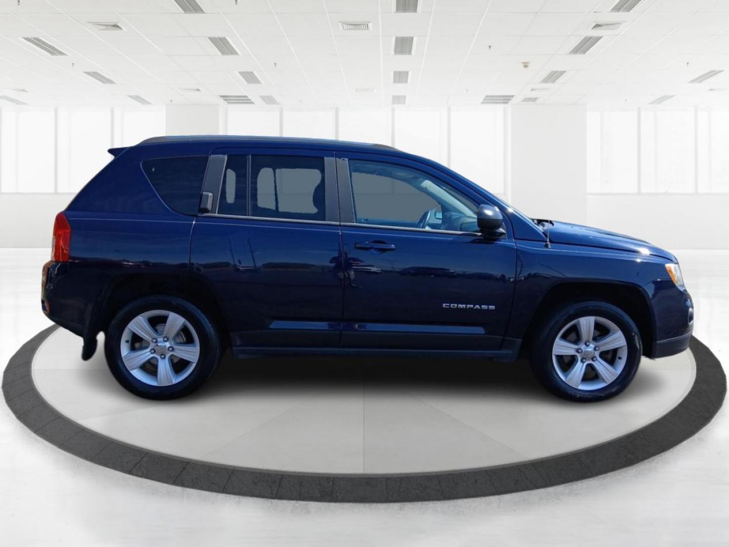 2013 True Blue Pearlcoat Jeep Compass Latitude FWD (1C4NJCEB0DD) with an 2.4L L4 DOHC 16V engine, Continuously Variable Transmission transmission, located at 401 Woodman Dr, Riverside, OH, 45431, (937) 908-9800, 39.763779, -84.122063 - Photo#1