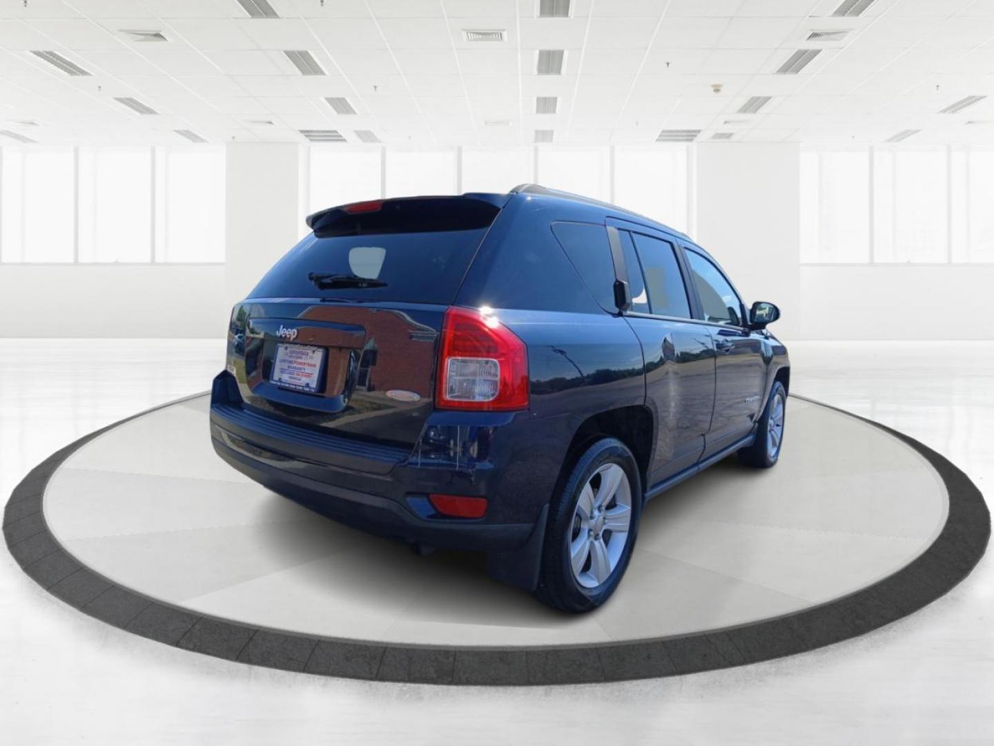 2013 True Blue Pearlcoat Jeep Compass Latitude FWD (1C4NJCEB0DD) with an 2.4L L4 DOHC 16V engine, Continuously Variable Transmission transmission, located at 401 Woodman Dr, Riverside, OH, 45431, (937) 908-9800, 39.763779, -84.122063 - Photo#2