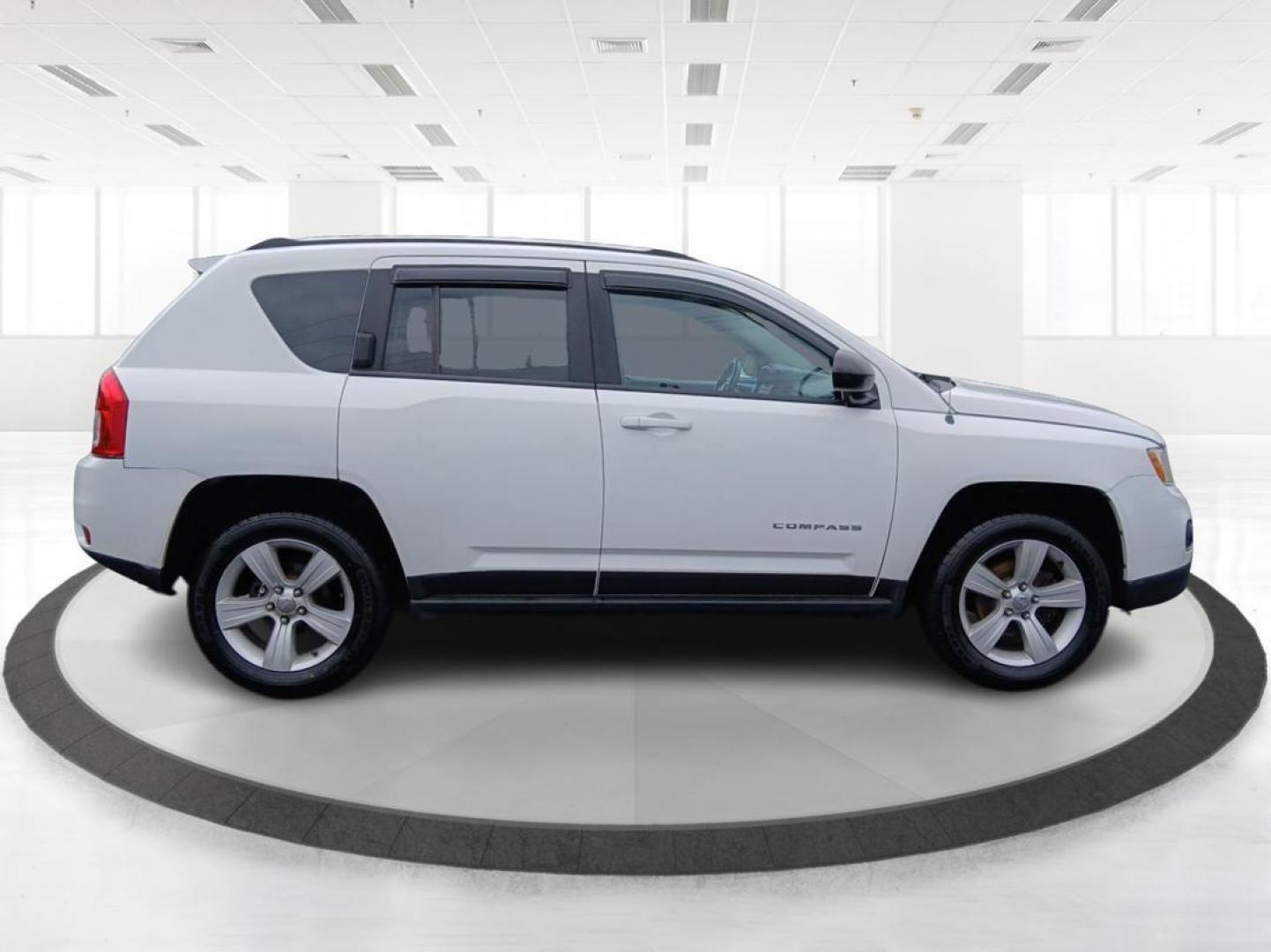 2013 Winter Chill Pearlcoat Jeep Compass Latitude 4WD (1C4NJDEB5DD) with an 2.4L L4 DOHC 16V engine, Continuously Variable Transmission transmission, located at 4508 South Dixie Dr, Moraine, OH, 45439, (937) 908-9800, 39.690136, -84.216438 - Photo#1