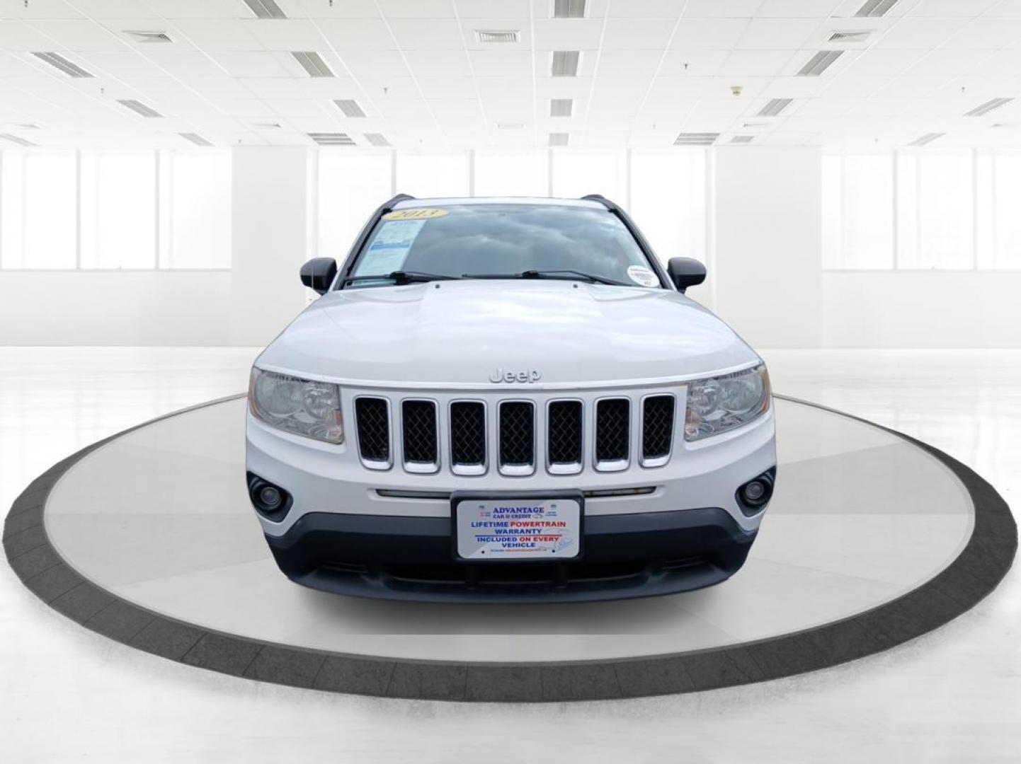 2013 Winter Chill Pearlcoat Jeep Compass Latitude 4WD (1C4NJDEB5DD) with an 2.4L L4 DOHC 16V engine, Continuously Variable Transmission transmission, located at 4508 South Dixie Dr, Moraine, OH, 45439, (937) 908-9800, 39.690136, -84.216438 - Photo#6