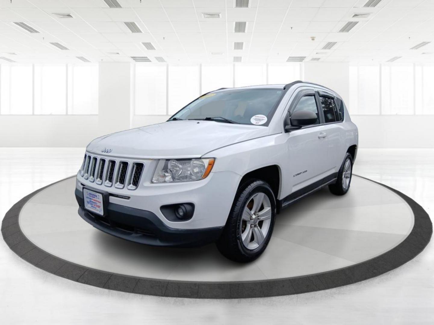 2013 Winter Chill Pearlcoat Jeep Compass Latitude 4WD (1C4NJDEB5DD) with an 2.4L L4 DOHC 16V engine, Continuously Variable Transmission transmission, located at 4508 South Dixie Dr, Moraine, OH, 45439, (937) 908-9800, 39.690136, -84.216438 - Photo#7