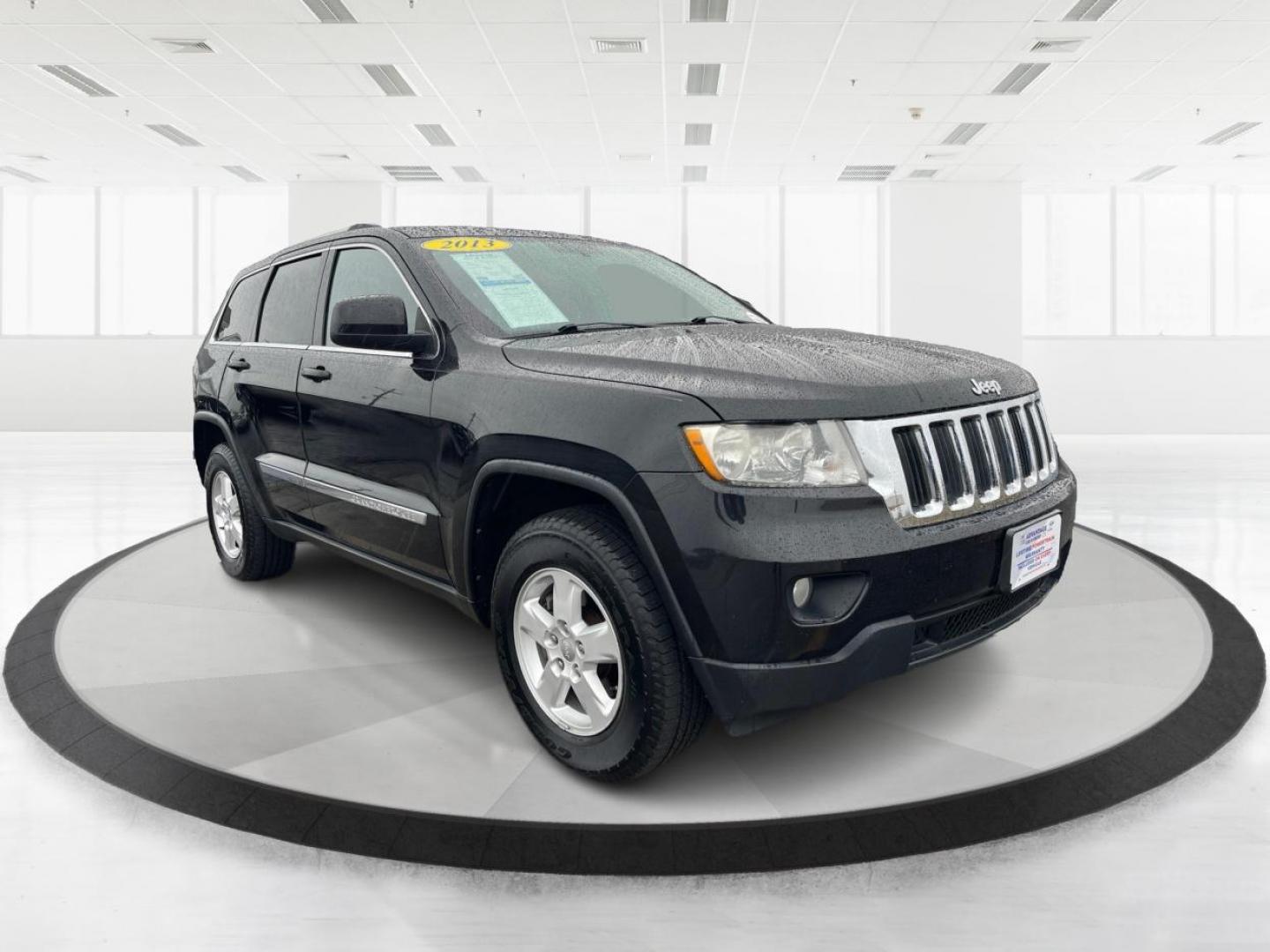 2013 Jeep Grand Cherokee Laredo 4WD (1C4RJFAG7DC) with an 3.6L V6 DOHC 24V engine, 5-Speed Automatic transmission, located at 4508 South Dixie Dr, Moraine, OH, 45439, (937) 908-9800, 39.689976, -84.218452 - 2013 Jeep Grand Cherokee Laredo 4WD - Photo#0