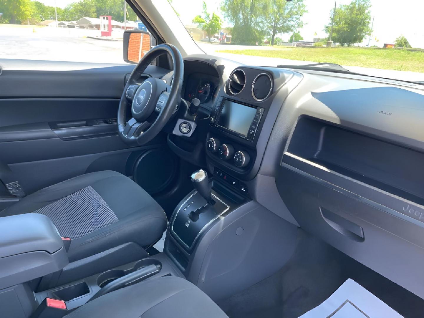 2013 Bright Silver Metallic Jeep Patriot Latitude 2WD (1C4NJPFBXDD) with an 2.4L L4 DOHC 16V engine, located at 1951 S Dayton Lakeview Rd., New Carlisle, OH, 45344, (937) 908-9800, 39.890999, -84.050255 - Photo#8