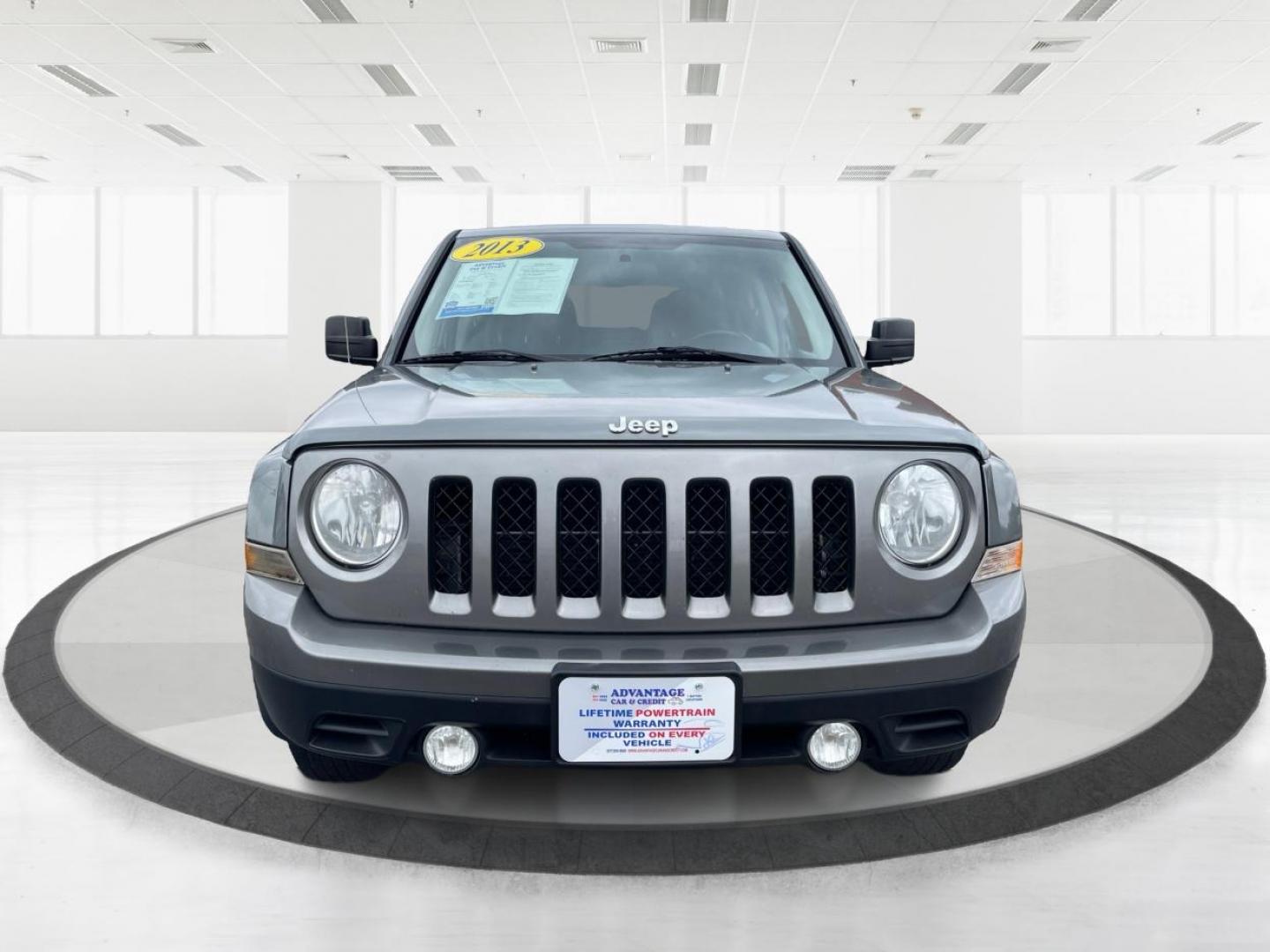 2013 Mineral Gray Metallic Jeep Patriot Latitude 4WD (1C4NJRFB5DD) with an 2.4L L4 DOHC 16V engine, located at 1099 N County Rd 25A, OH, 45373, (937) 908-9800, 40.057079, -84.212883 - Photo#6