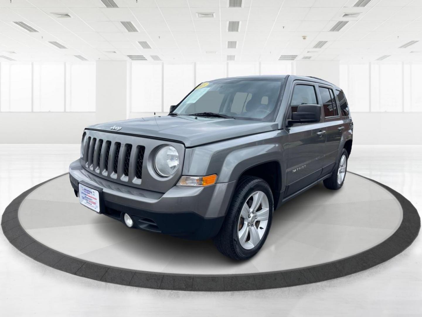 2013 Mineral Gray Metallic Jeep Patriot Latitude 4WD (1C4NJRFB5DD) with an 2.4L L4 DOHC 16V engine, located at 1099 N County Rd 25A, OH, 45373, (937) 908-9800, 40.057079, -84.212883 - Photo#7