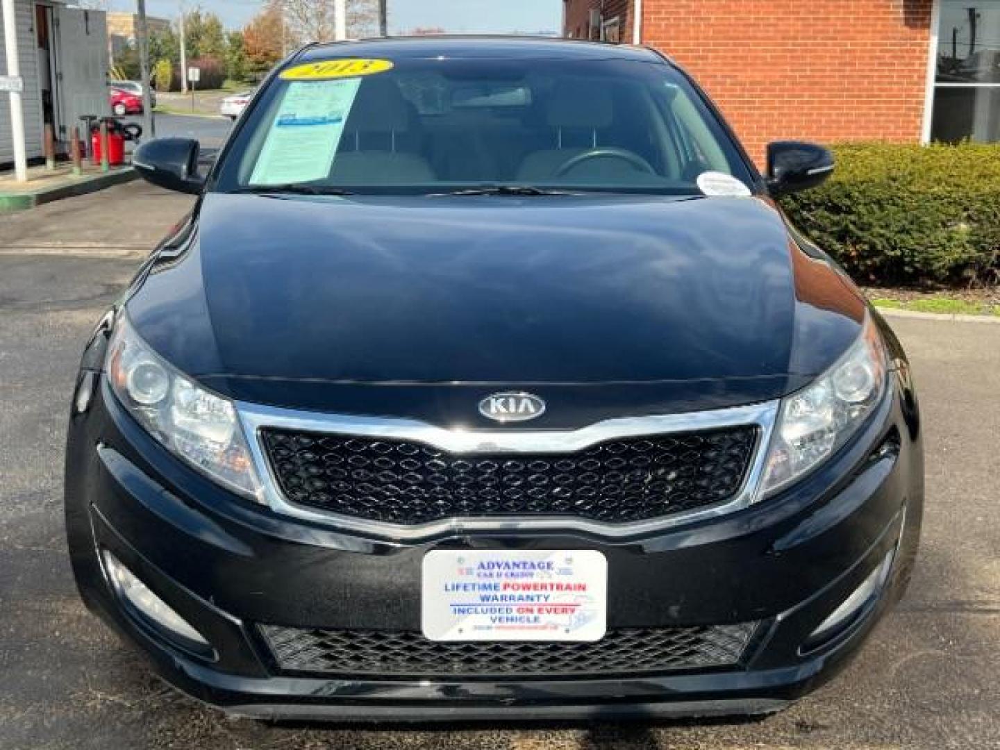 2013 Ebony Black Kia Optima LX AT (5XXGM4A7XDG) with an 2.4L L4 DOHC 16V engine, 6-Speed Automatic transmission, located at 1099 N County Rd 25A, OH, 45373, (937) 908-9800, 40.057079, -84.212883 - Photo#1