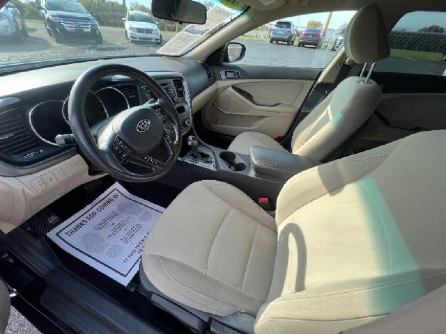 2013 Ebony Black Kia Optima LX AT (5XXGM4A7XDG) with an 2.4L L4 DOHC 16V engine, 6-Speed Automatic transmission, located at 1099 N County Rd 25A, OH, 45373, (937) 908-9800, 40.057079, -84.212883 - Photo#6