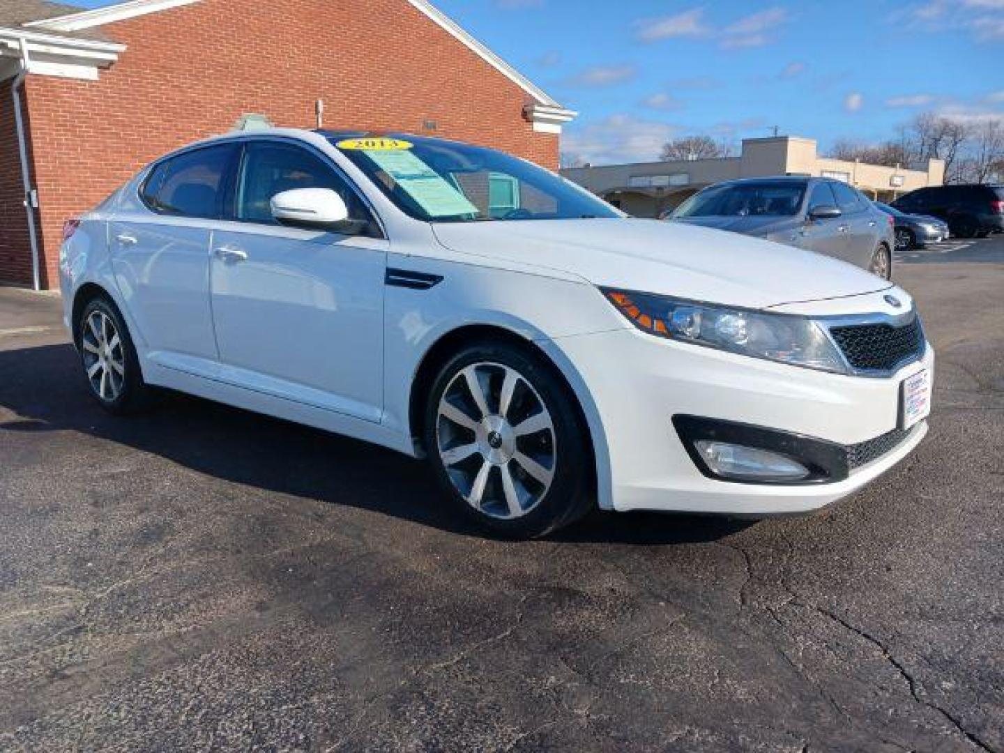 2013 Snow White Pearl Kia Optima EX (5XXGN4A7XDG) with an 2.4L L4 DOHC 16V engine, 6-Speed Automatic transmission, located at 401 Woodman Dr, Riverside, OH, 45431, (937) 908-9800, 39.763779, -84.122063 - Photo#0